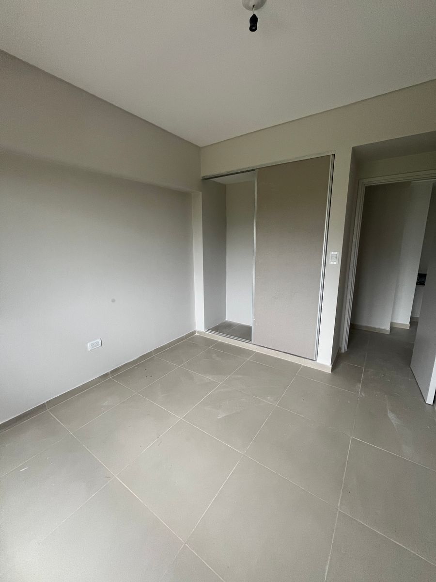 VENTA DEPARTAMENTO DOS DORMITORIOS CON BALCON EN L Y COCHERA - 9