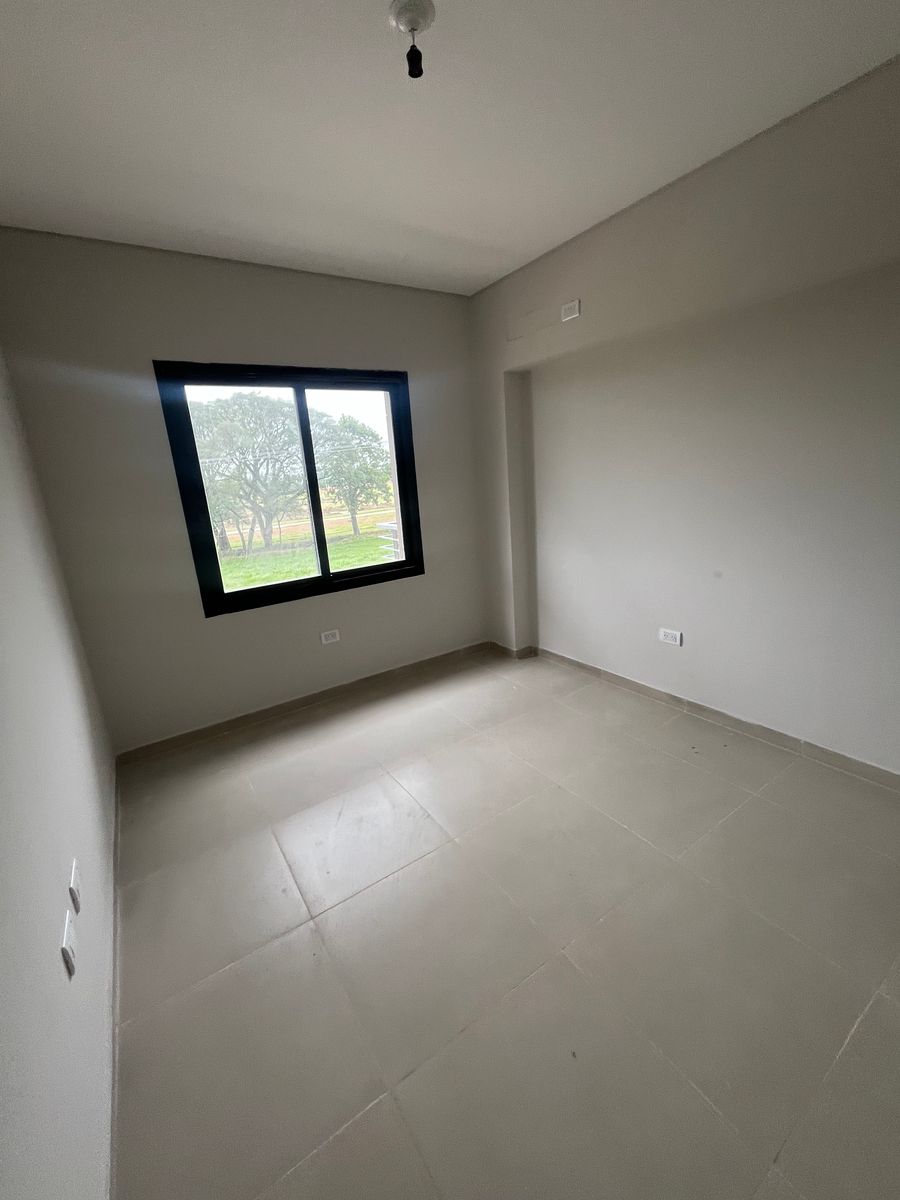 VENTA DEPARTAMENTO DOS DORMITORIOS CON BALCON EN L Y COCHERA - 11