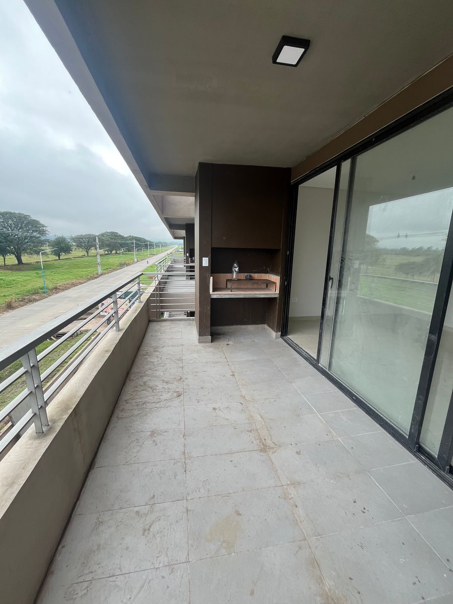 VENTA DEPARTAMENTO DOS DORMITORIOS CON BALCON EN L Y COCHERA - 13