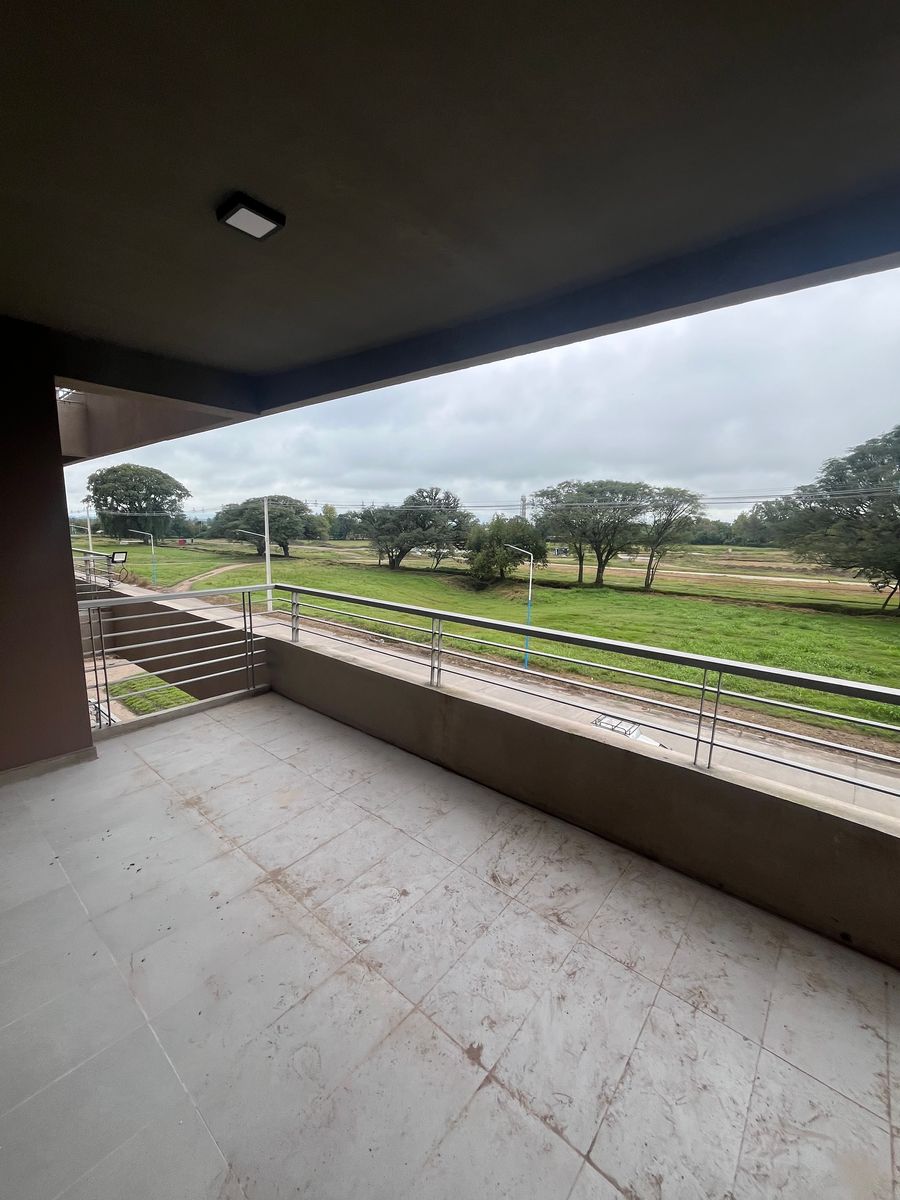 VENTA DEPARTAMENTO DOS DORMITORIOS CON BALCON EN L Y COCHERA - 14