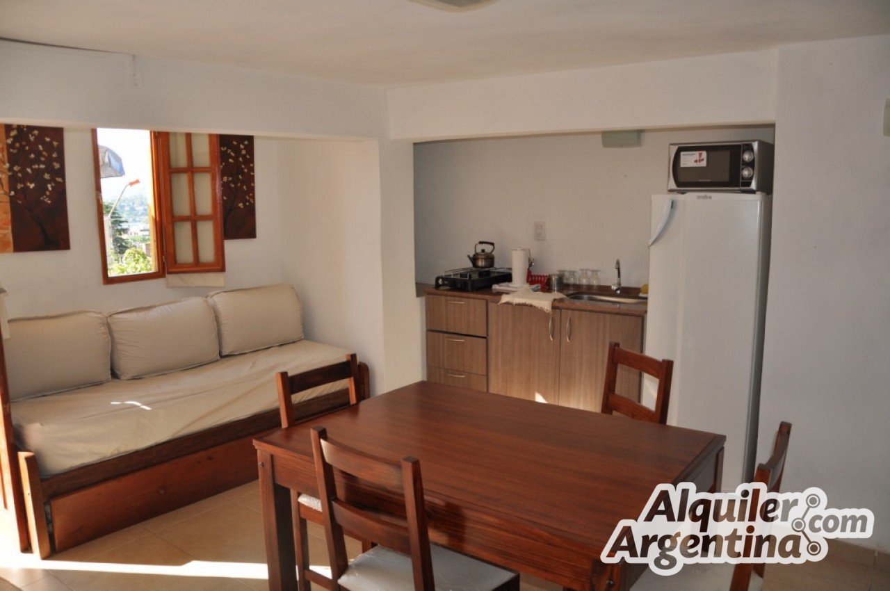 COMPLEJO DE DEPTOS CON ESPECTACULAR VISTA PANORAMICA. UN DORMITORIO. COCHERA. PISCINA. SOLARIUM. EQUIPAMIENTO FULL. A 5 MINUTOS DEL CENTRO DE CARLOS PAZ - 14
