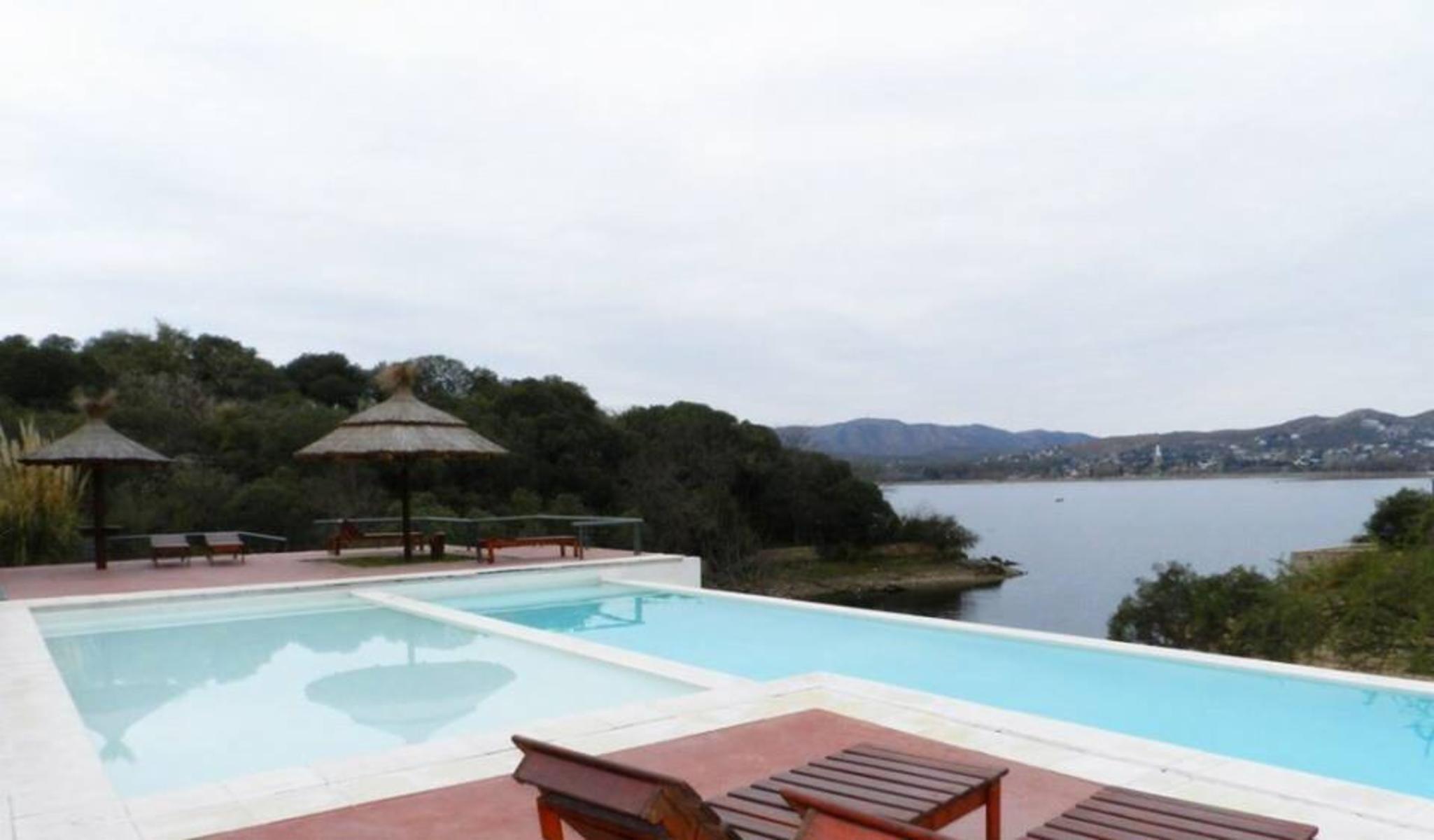 DEPARTAMENTO EN EXCLUSIVO COMPLEJO TERRAZAS DEL LAGO. UN DORMITORIO. COCHERA. PILETA