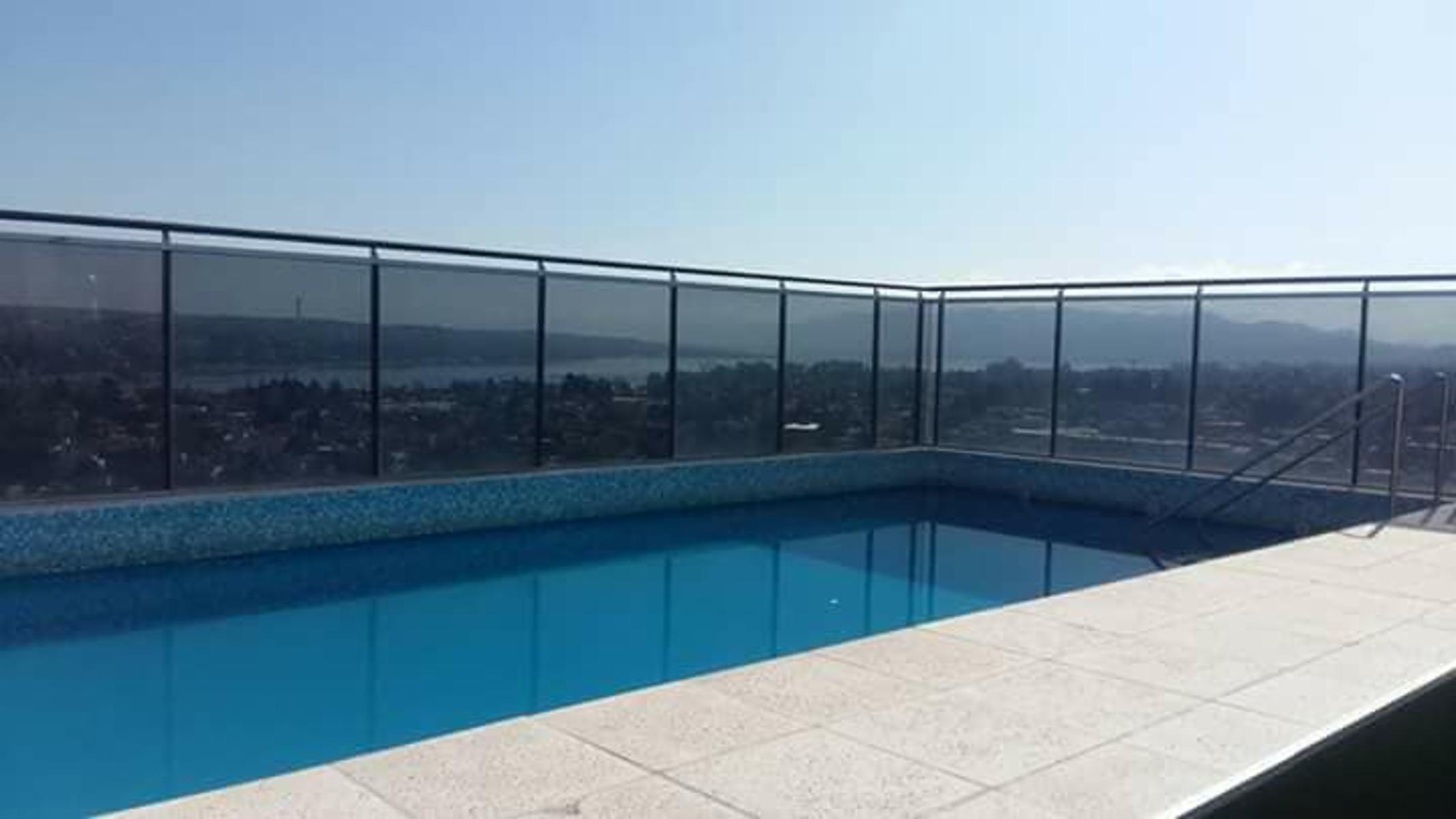 DEPARTAMENTO EN EDIFICIO DE CATEGORIA EN ZONA CENTRICA. PISCINA. TERRAZA CON VISTA PANORAMICA. QUINCHO. COCHERA. ASADOR. GIM — foto 4