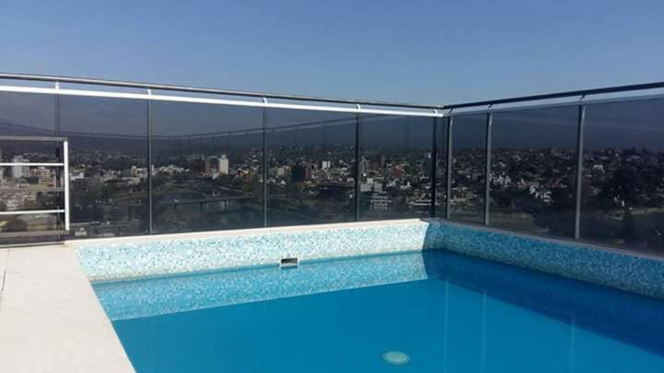 DEPARTAMENTO EN EDIFICIO DE CATEGORIA EN ZONA CENTRICA. PISCINA. TERRAZA CON VISTA PANORAMICA. QUINCHO. COCHERA. ASADOR. GIM — foto 5