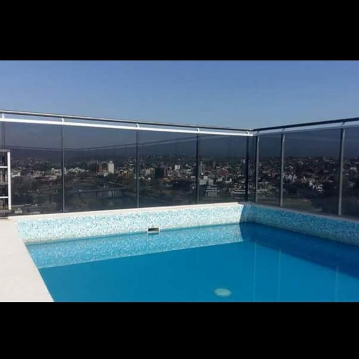 DEPARTAMENTO EN EDIFICIO DE CATEGORIA EN ZONA CENTRICA. PISCINA. TERRAZA CON VISTA PANORAMICA. QUINCHO. COCHERA. ASADOR. GIM — foto 14
