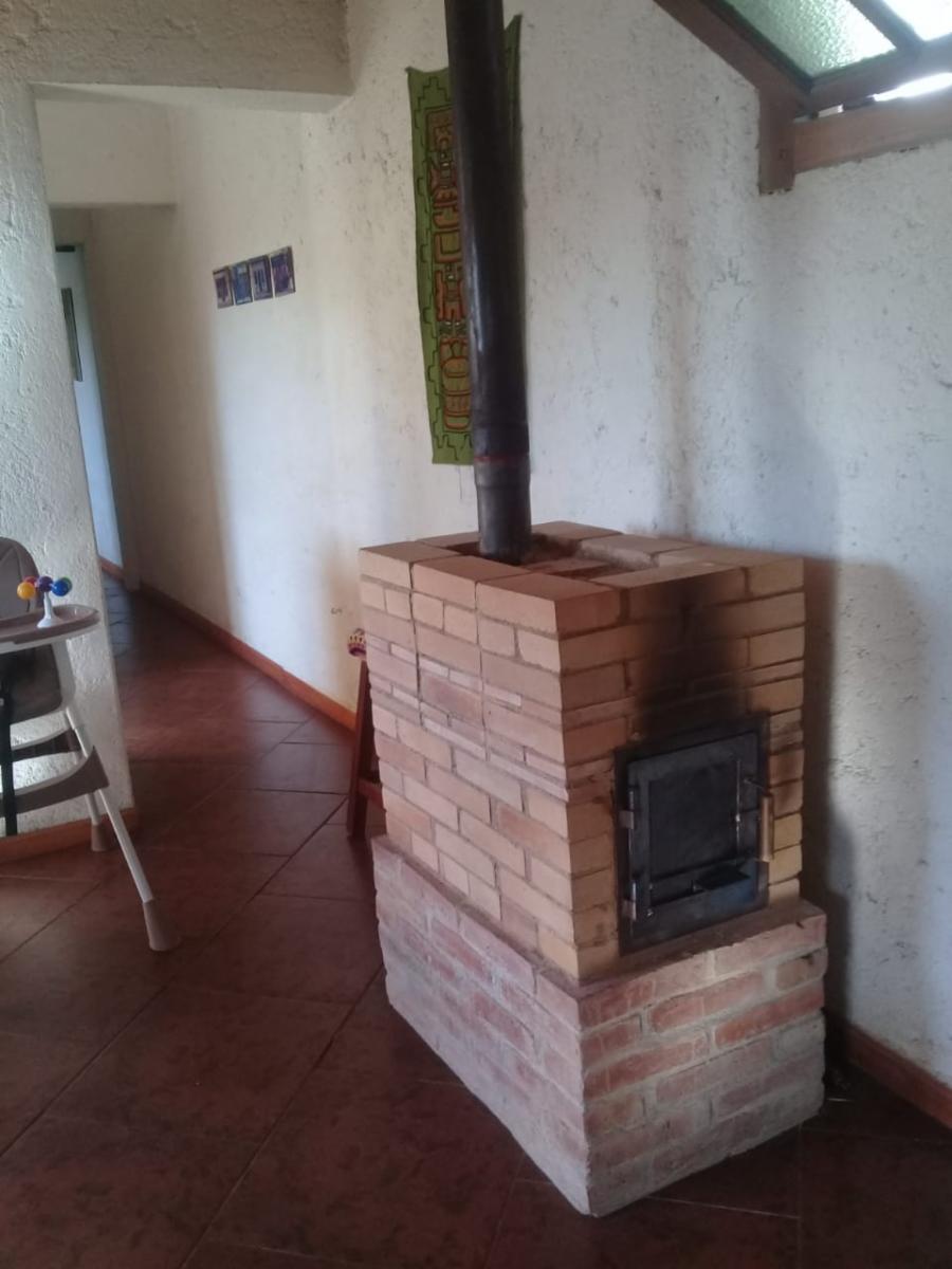 CASA DOS DORMITORIOS CON PATIO COCHERA Y ASADOR EN RIO CEBALLOS — foto 11