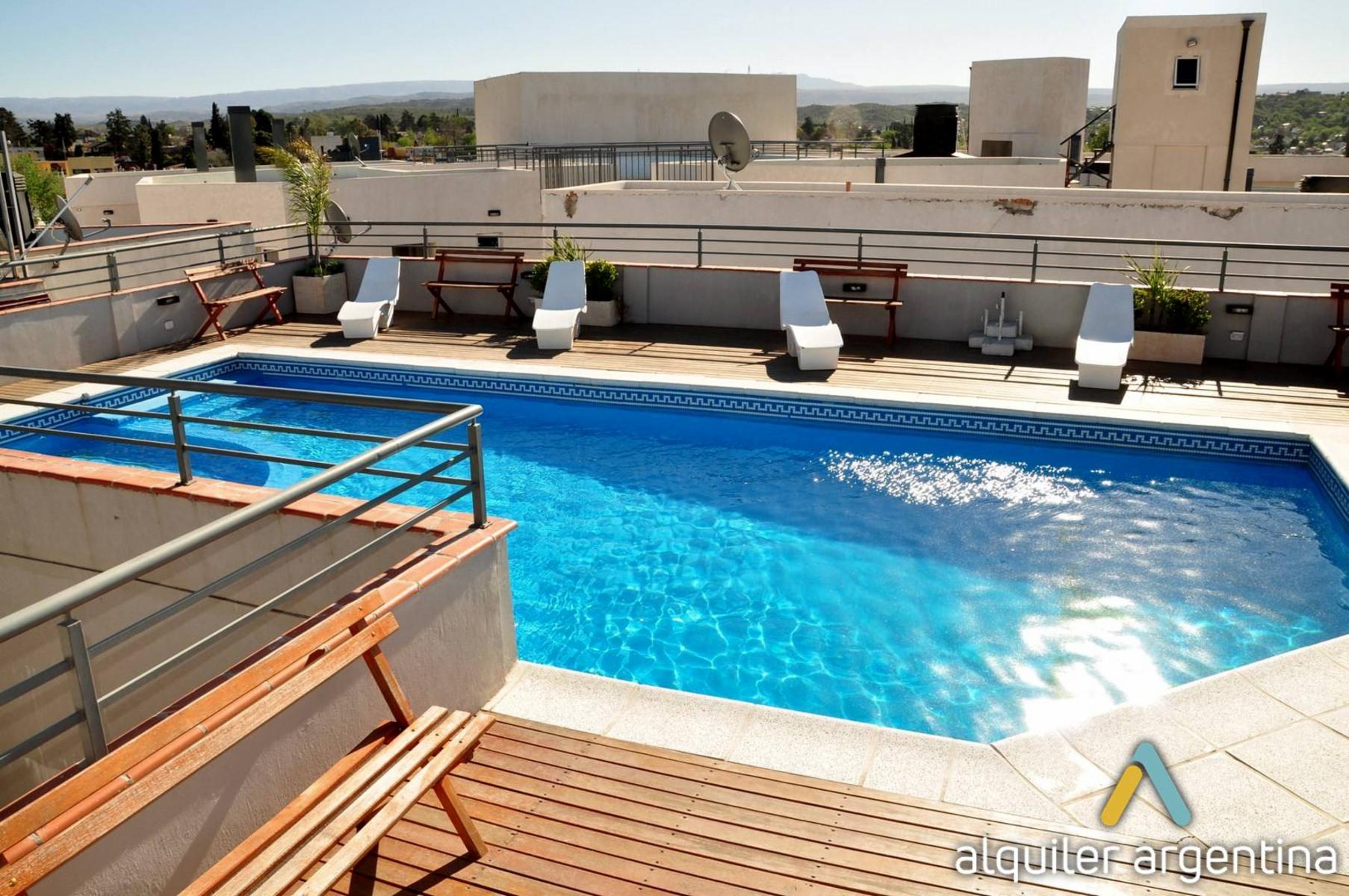 DEPARTAMENTOS EN PLENO CENTRO DE CARLOS PAZ. CON PISCINA - QUINCHO - COCHERA - TERRAZA - COCHERA. EQUIPAMIENTO FULL — foto 6