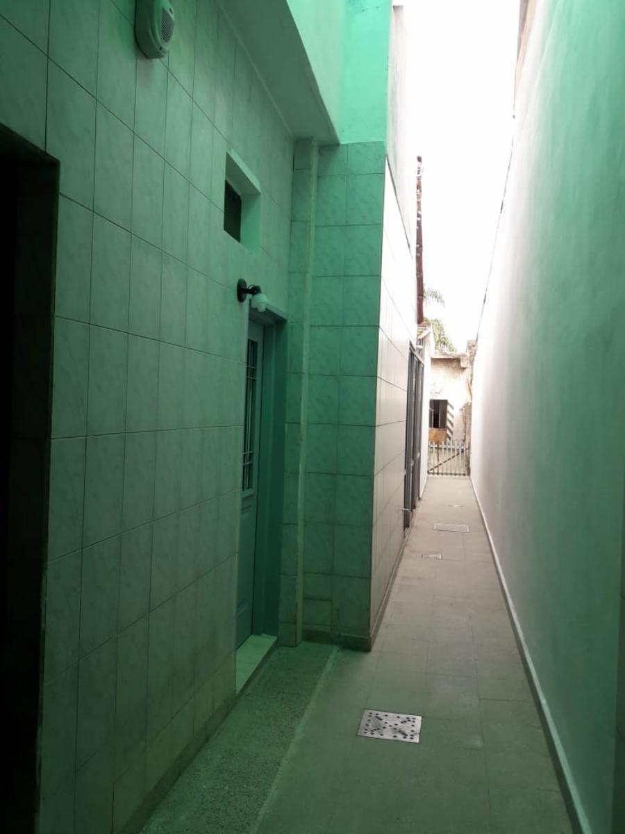 NUEVO PRECIO OPORTUNIDAD Inversores. CASA EN VENTA: Sobre amplio Lote propio Casa 3 amb. c/coch. + dpto. 2 amb. + fondo + galpón. Con renta. — foto 8