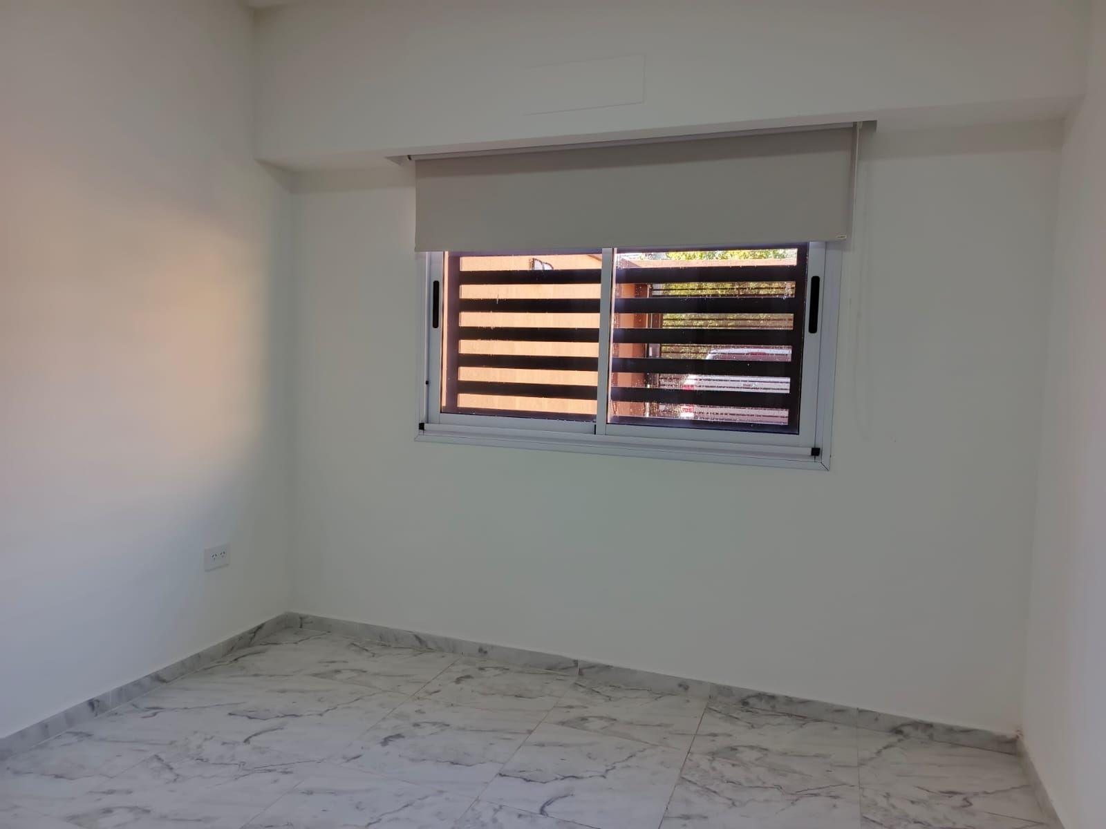 DEPARTAMENTO 2 AMBIENTES AL FRENTE CON COCHERA DESCUBIERTA - 12
