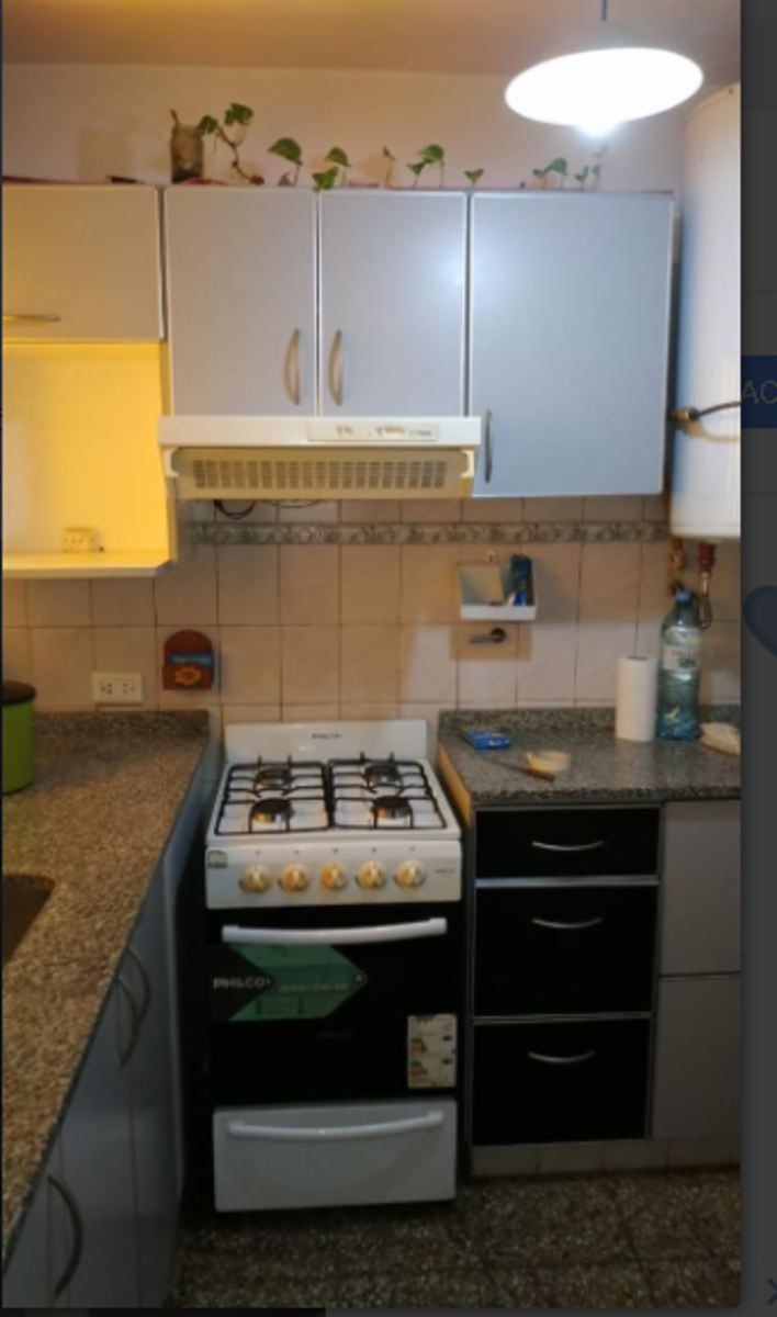 DEPARTAMENTO DE DOS DORMITORIOS , PLANTA BAJA . CON COCHERA . CENTRO — foto 11