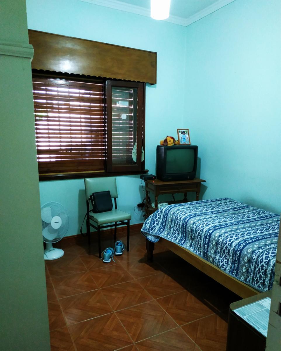 CASA TRES AMBIENTES CON COCHERA Y FONDO LIBRE A METROS DE AV 25 DE MAYO — foto 2
