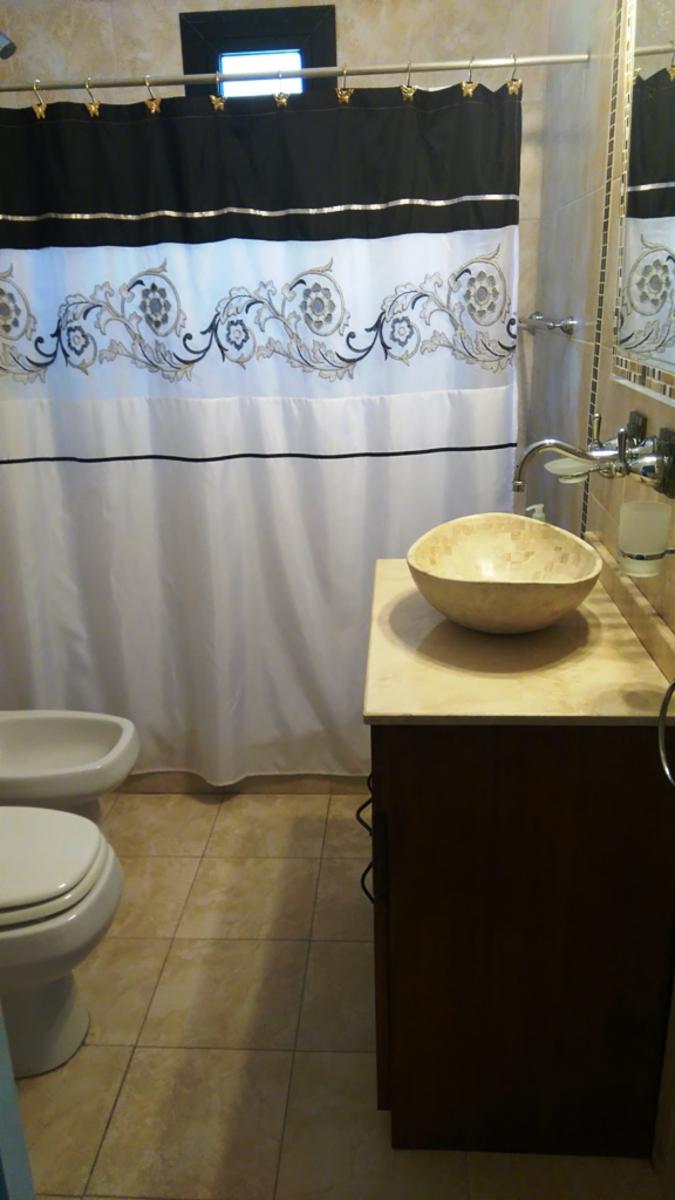 EXCELENTE CASA DE 4 AMBIENTES EN COSTA DEL ESTE — foto 11