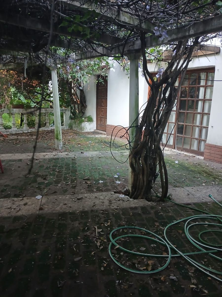 Gran PH atrás con jardín - 21
