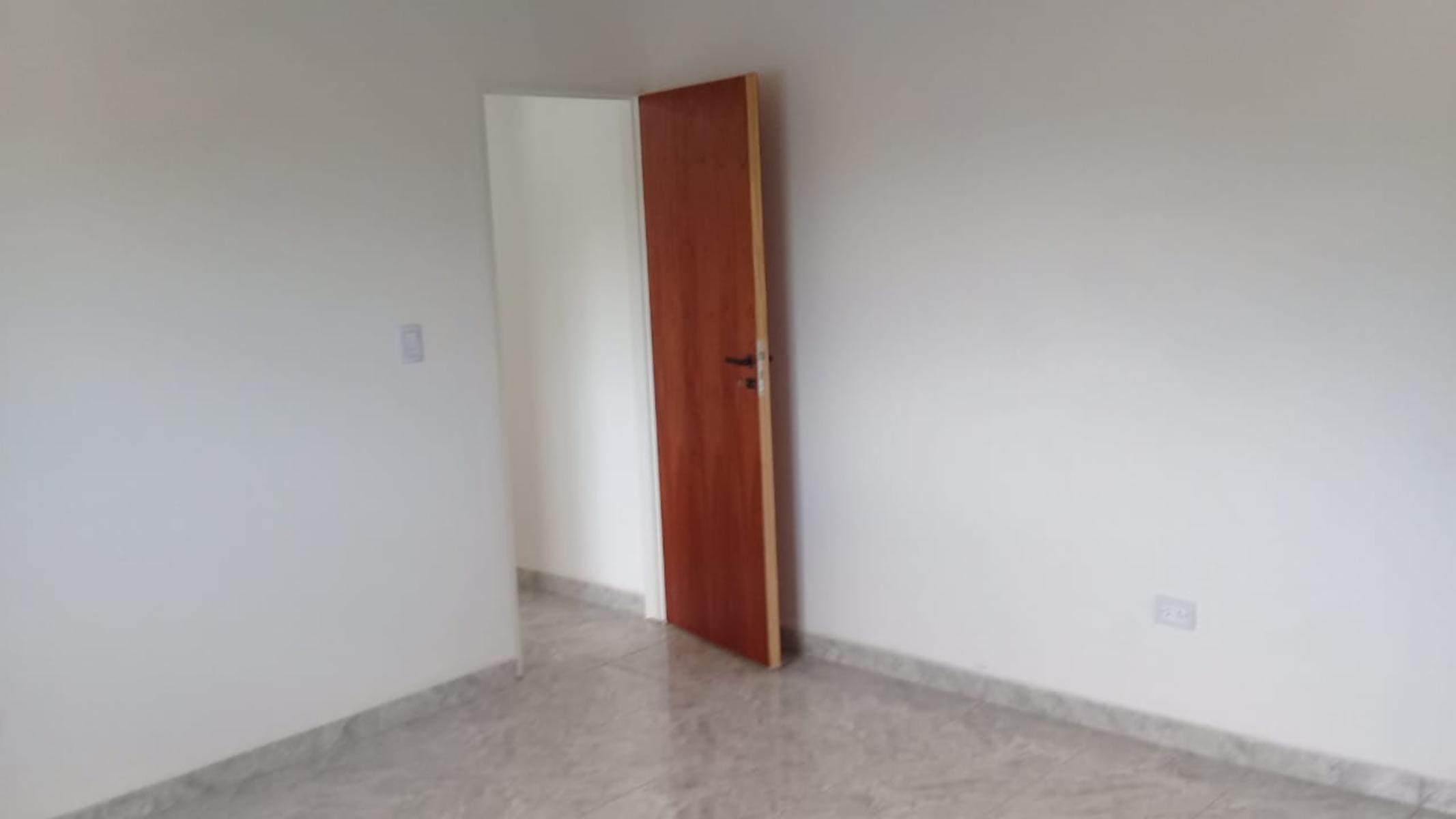 Departamento de dos dormitorios, baño, cocina comedor, con cochera a estenar - 8