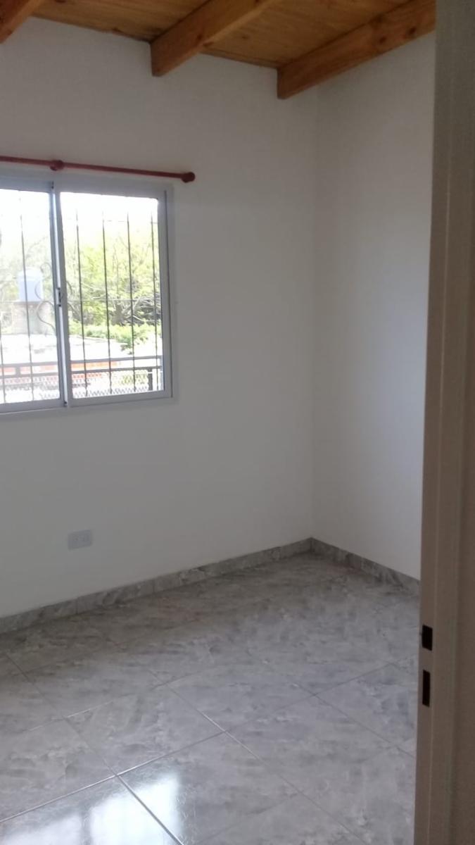 Departamento de dos dormitorios, baño, cocina comedor, con cochera a estenar - 11