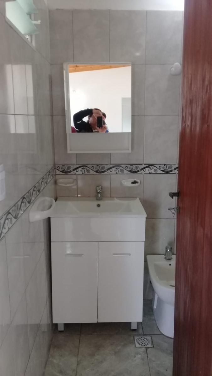 Departamento de dos dormitorios, baño, cocina comedor, con cochera a estenar - 12