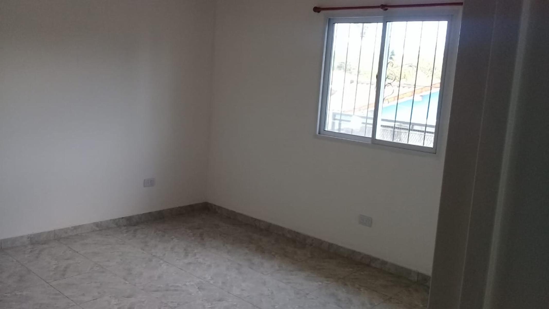 Departamento de dos dormitorios, baño, cocina comedor, con cochera a estenar - 13