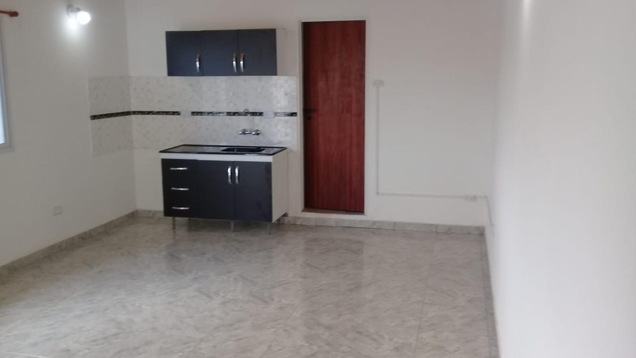 Departamento de dos dormitorios, baño, cocina comedor, con cochera a estenar - 14