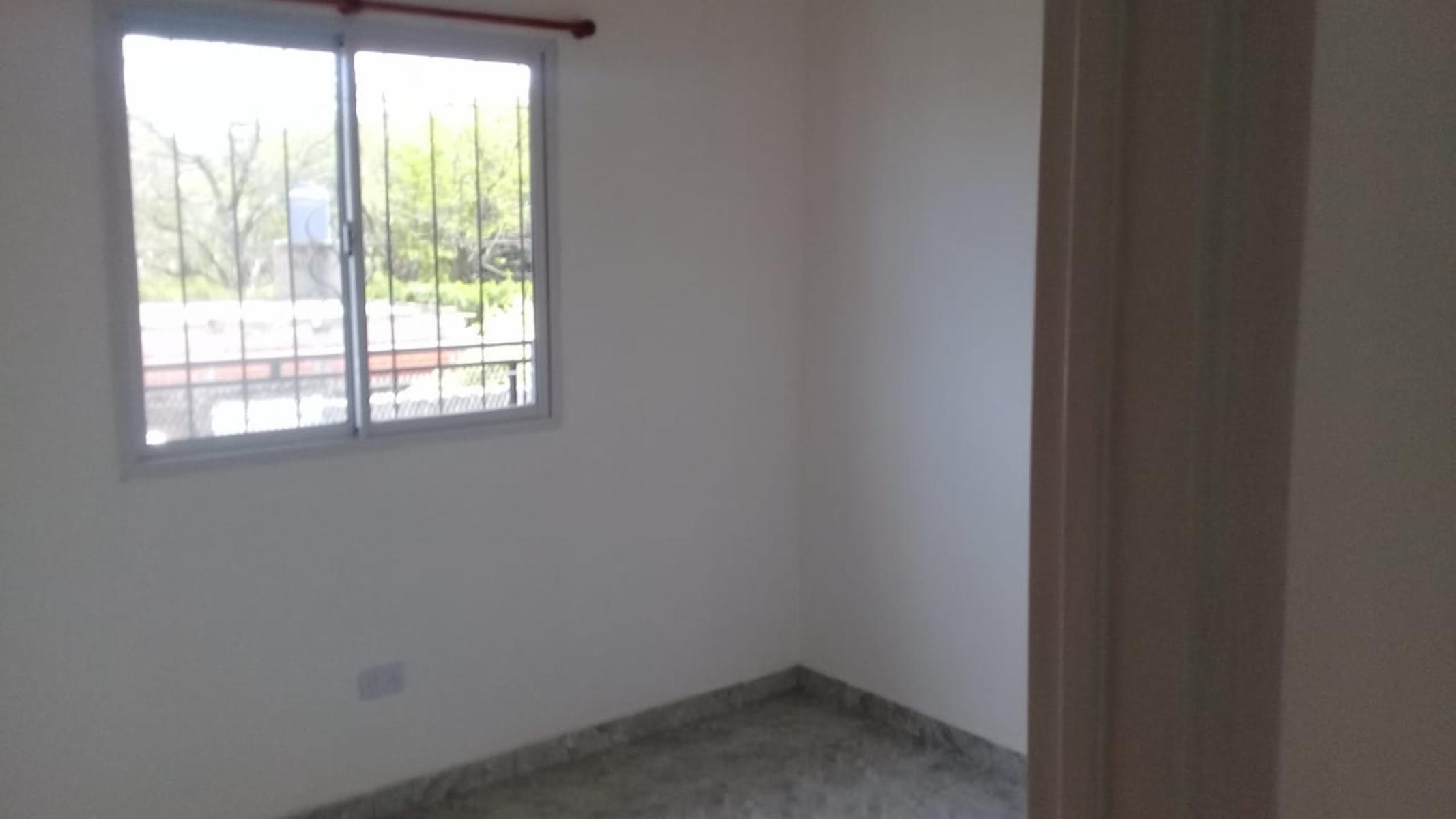 Departamento de dos dormitorios, baño, cocina comedor, con cochera a estenar - 15