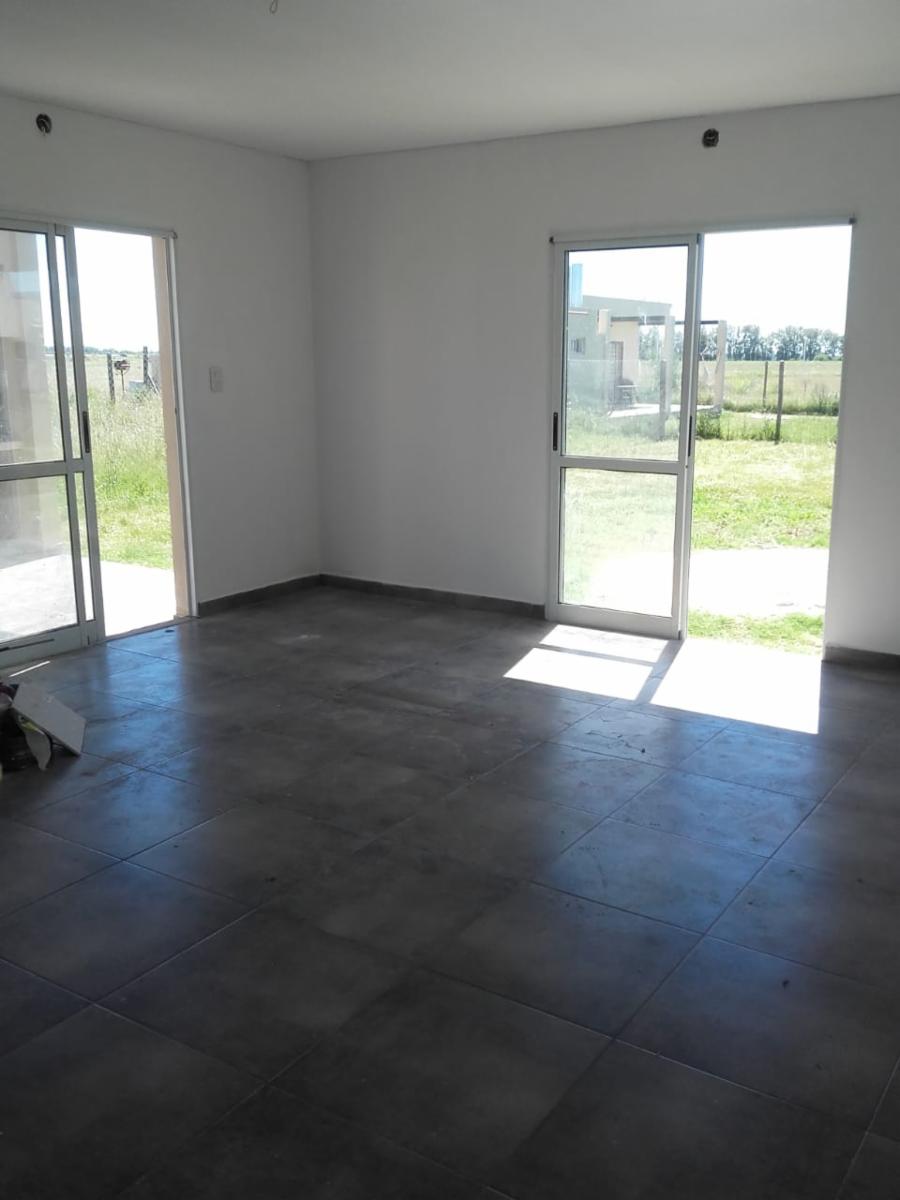 OPORTUNIDAD VENDE PROPIEDAD EN BARRIO ABIERTO FUNES NORTE ESTILO MODERNA — foto 9