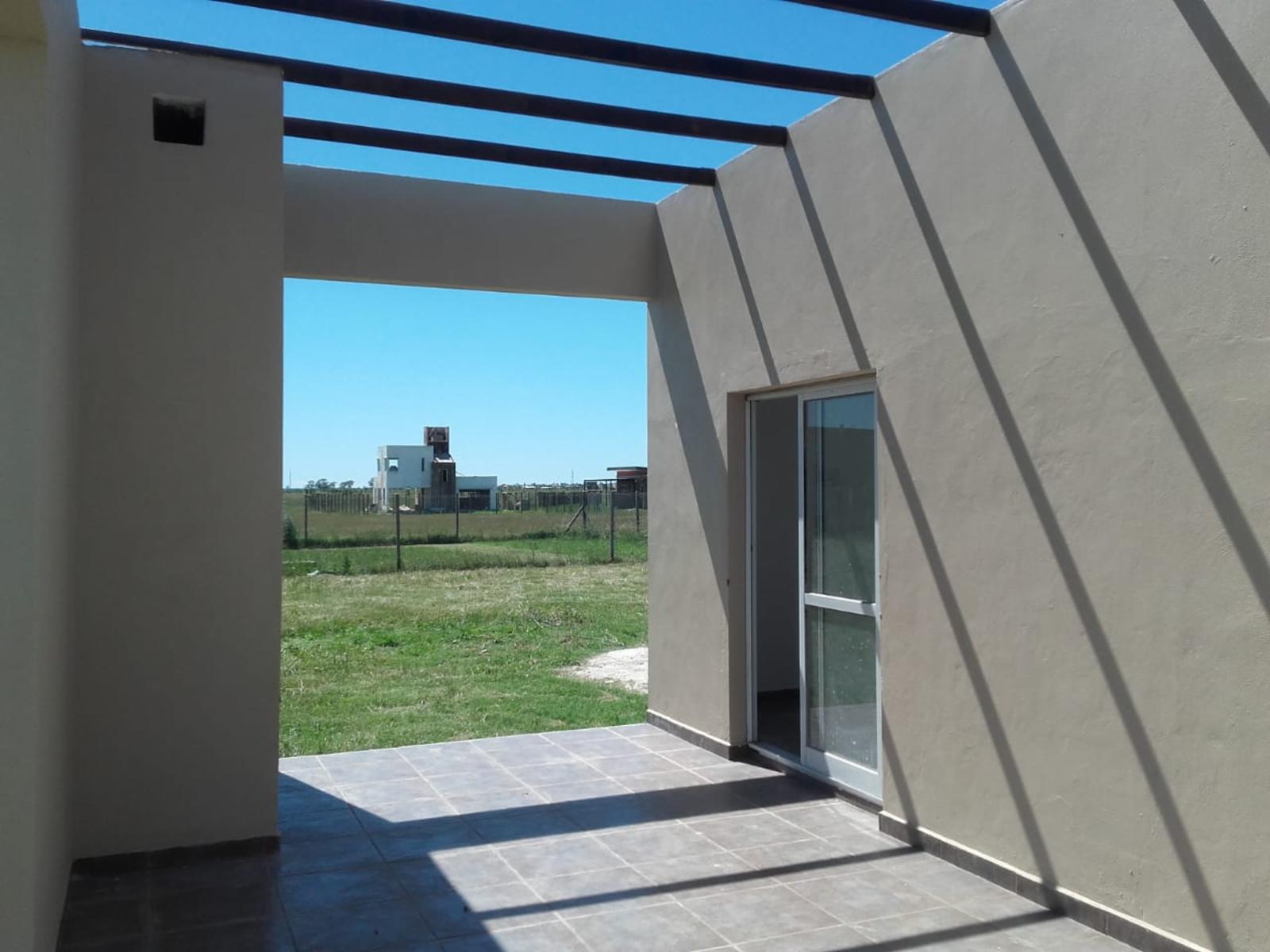 OPORTUNIDAD VENDE PROPIEDAD EN BARRIO ABIERTO FUNES NORTE ESTILO MODERNA — foto 11