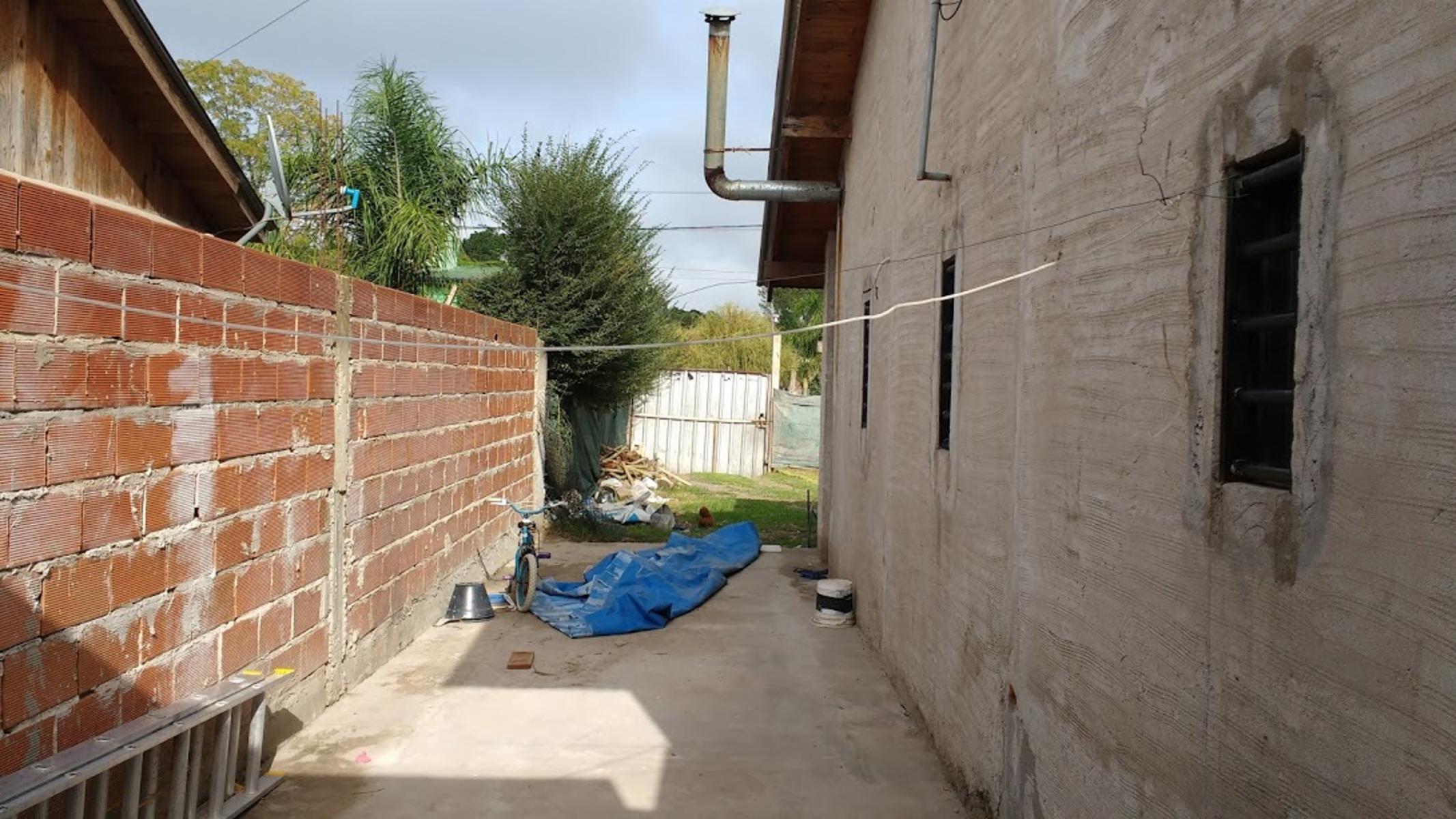 EXCELENTE CASA TRES AMBIENTES EN LOTE DE 10 X 28 CON ENTRADA PASANTE. — foto 3