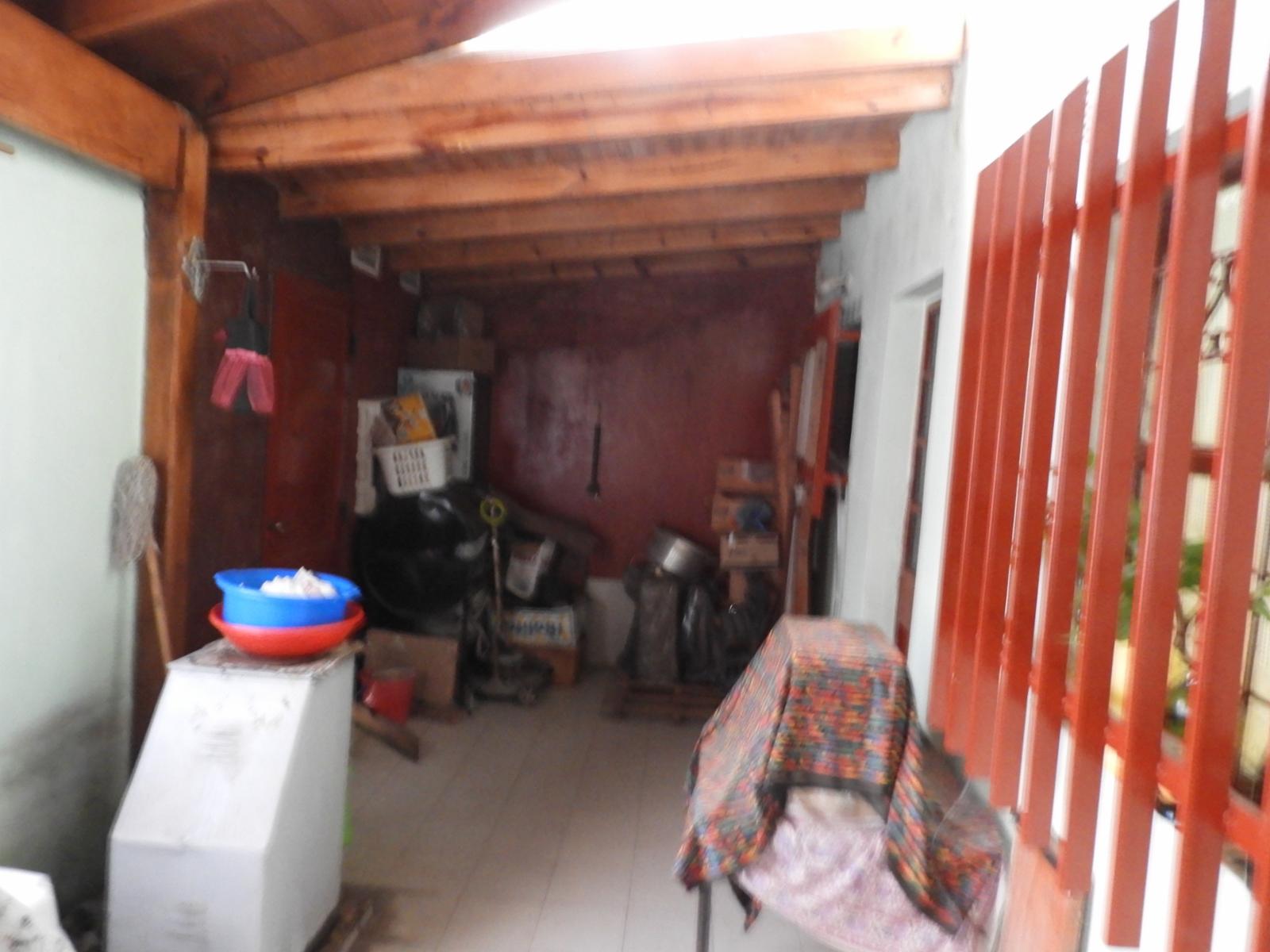 EXCELENTE CASA DE TRES AMBIENTES CON GARAGE JARDIN PATIO Y FONDO LIBRE — foto 11