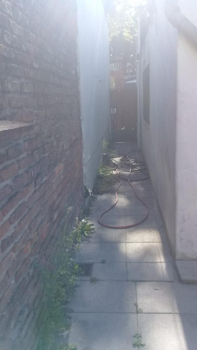 EXCELENTE PROPIEDAD DE CUATRO AMBIENTES CON GARAGE PATIO Y FONDO LIBRE — foto 9