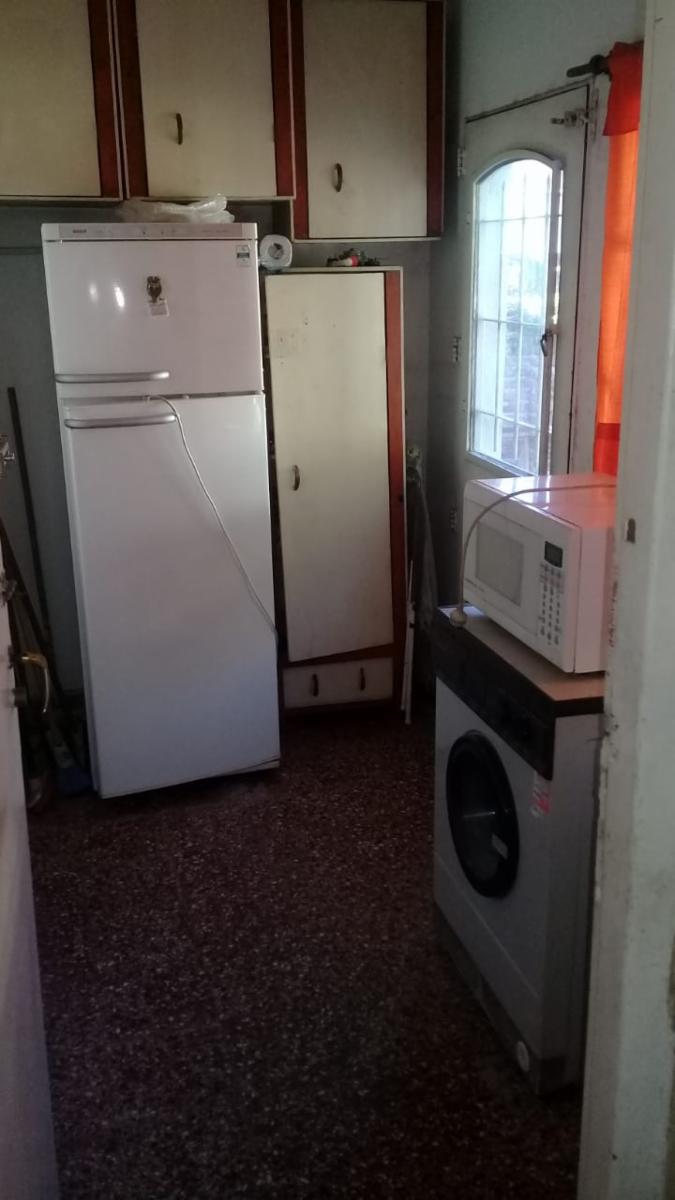 EXCELENTE PROPIEDAD DE CUATRO AMBIENTES CON GARAGE PATIO Y FONDO LIBRE — foto 10