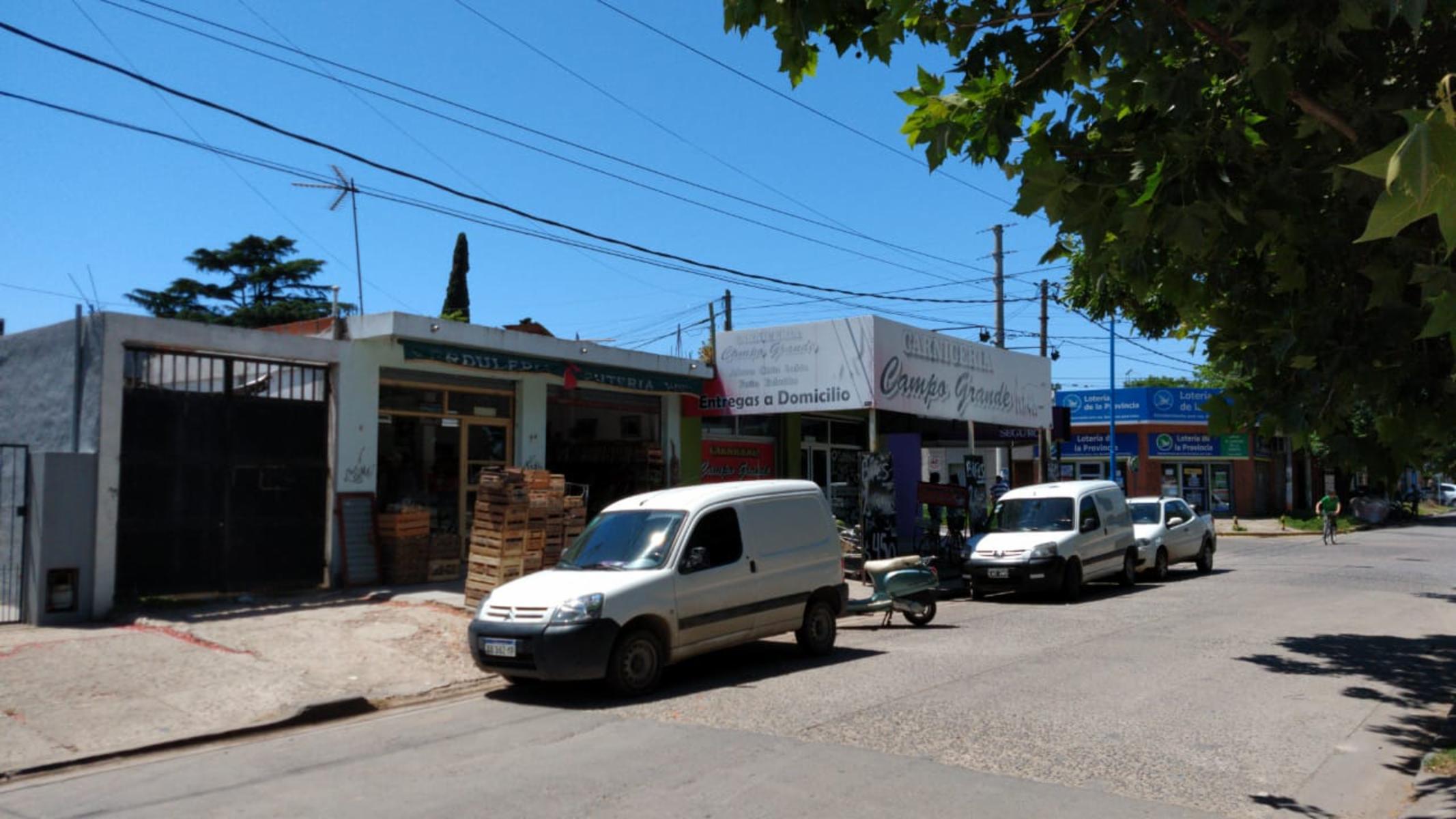EXCELENTE PROPIEDAD COMERCIAL DE SEIS LOCALES TOTALMENTE ALQUILADO Y VIVIENDA FAMILIAR DE TRES AMBIENTES CON COCHERA — foto 6