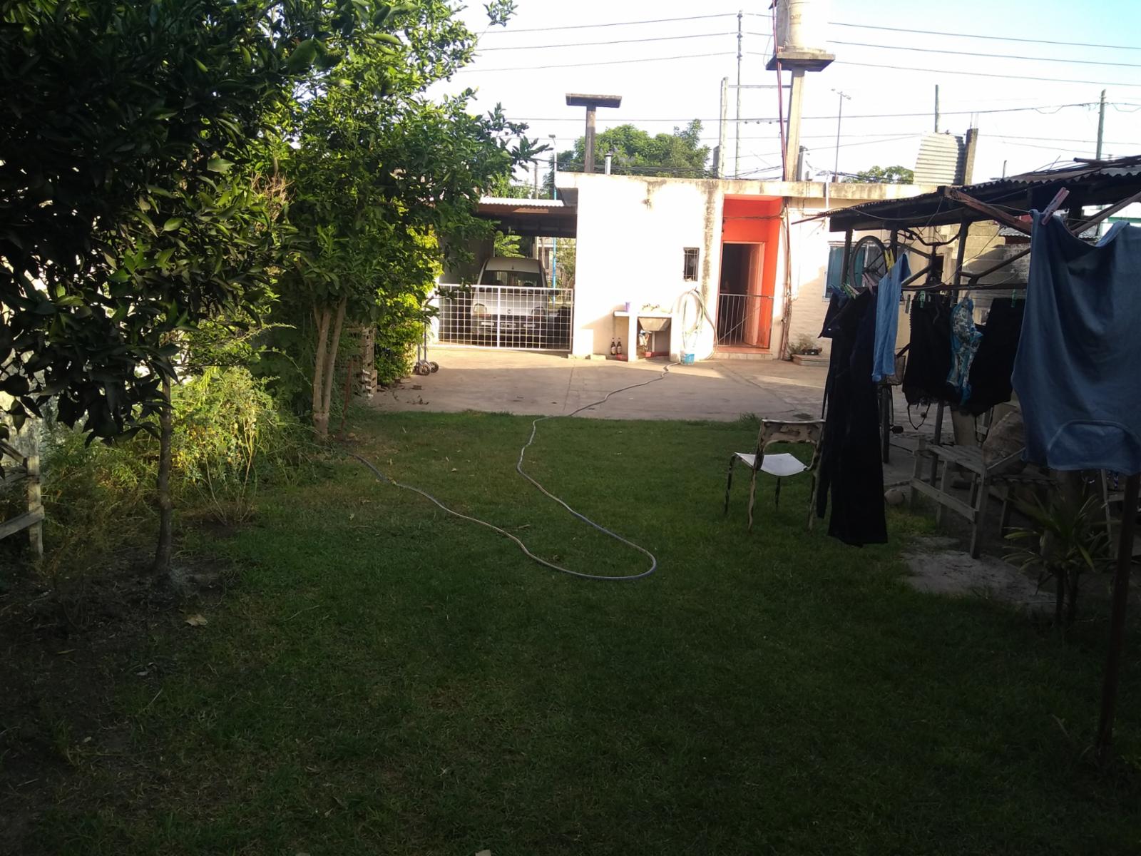 EXCELENTE PROPIEDAD CASA DE TRES AMBIENTES CON LOCAL COMERCIAL ENTRADA DE AUTO PATIO Y FONDO LIBRE — foto 9