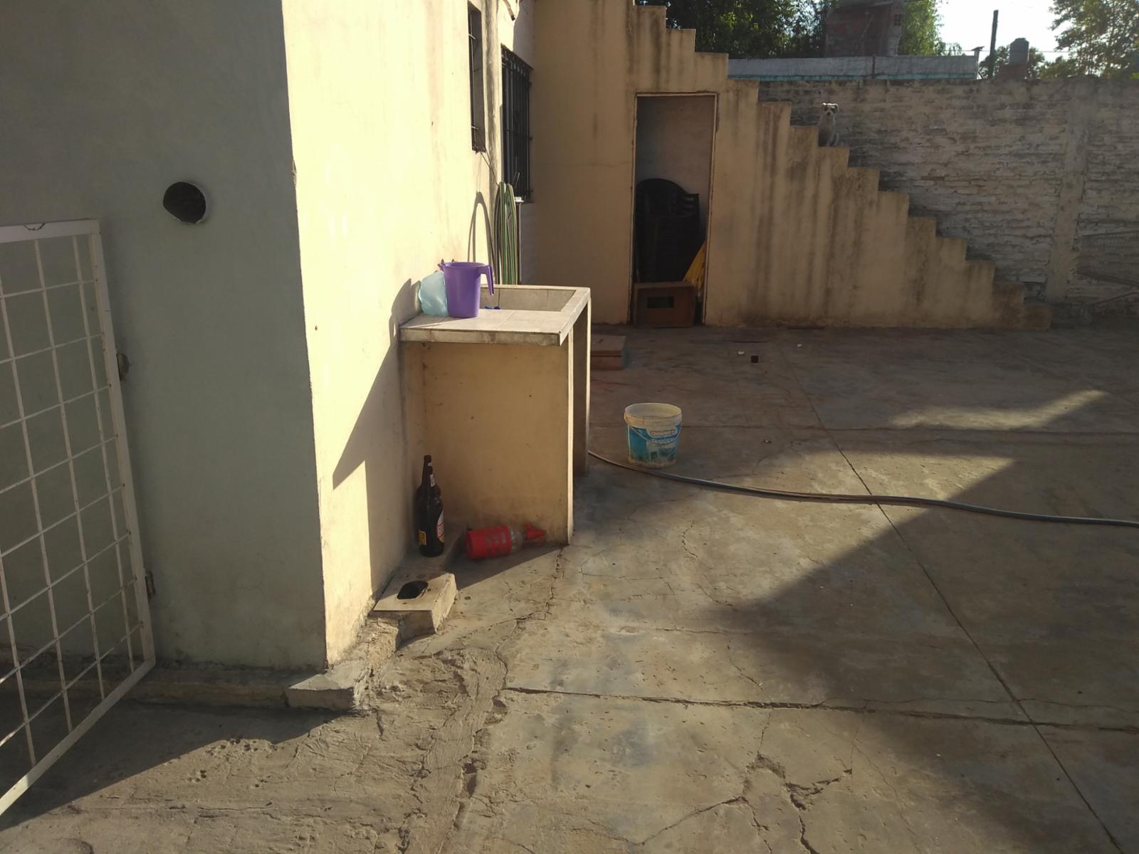 EXCELENTE PROPIEDAD CASA DE TRES AMBIENTES CON LOCAL COMERCIAL ENTRADA DE AUTO PATIO Y FONDO LIBRE — foto 14