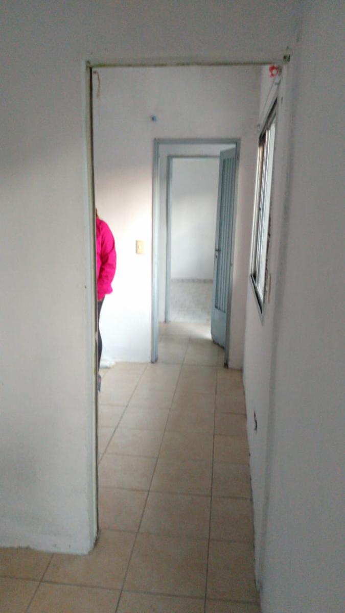 EXCELENTE PROPIEDAD DE TRES AMBIENTES MAS DOS DEPARTAMENTOS DE DOS AMBIENTES CON ENTRADA DE AUTO — foto 8
