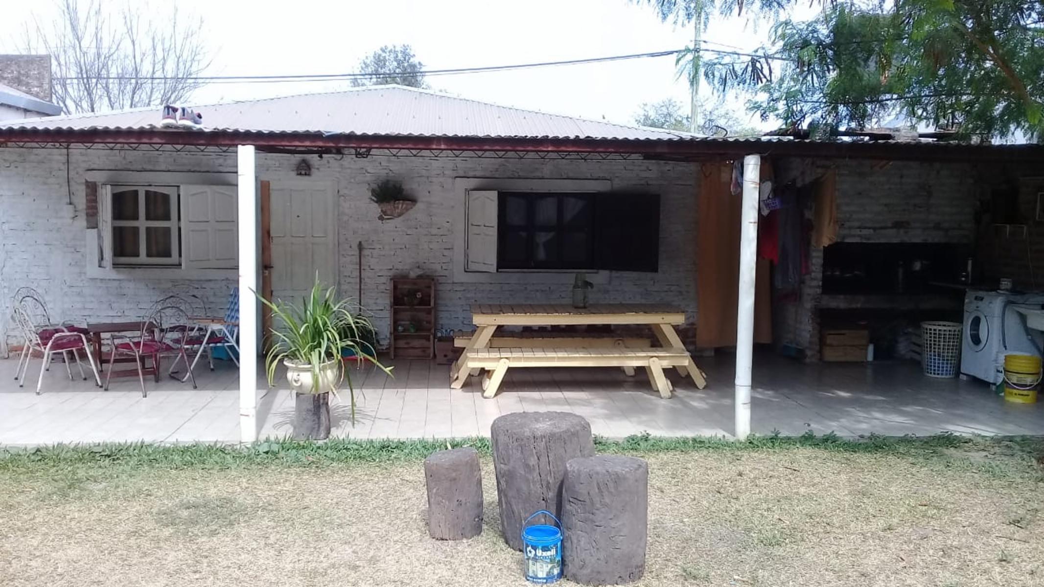 EXCELENTE PROPIEDAD CASA TRES AMBIENTES CON ENTRADA DE AUTO JARDIN PATIO Y FONDO LIBRE — foto 8