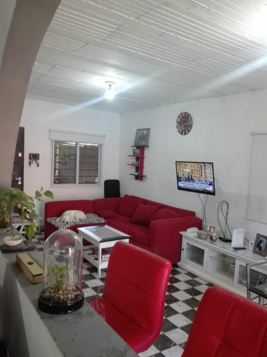 EXCELENTE PROPIEDAD DE CUATRO AMBIENTES CON LOCAL GARAGE PATIO BALCON Y DOS BAÑOS TODOS A EXTRENAR — foto 9