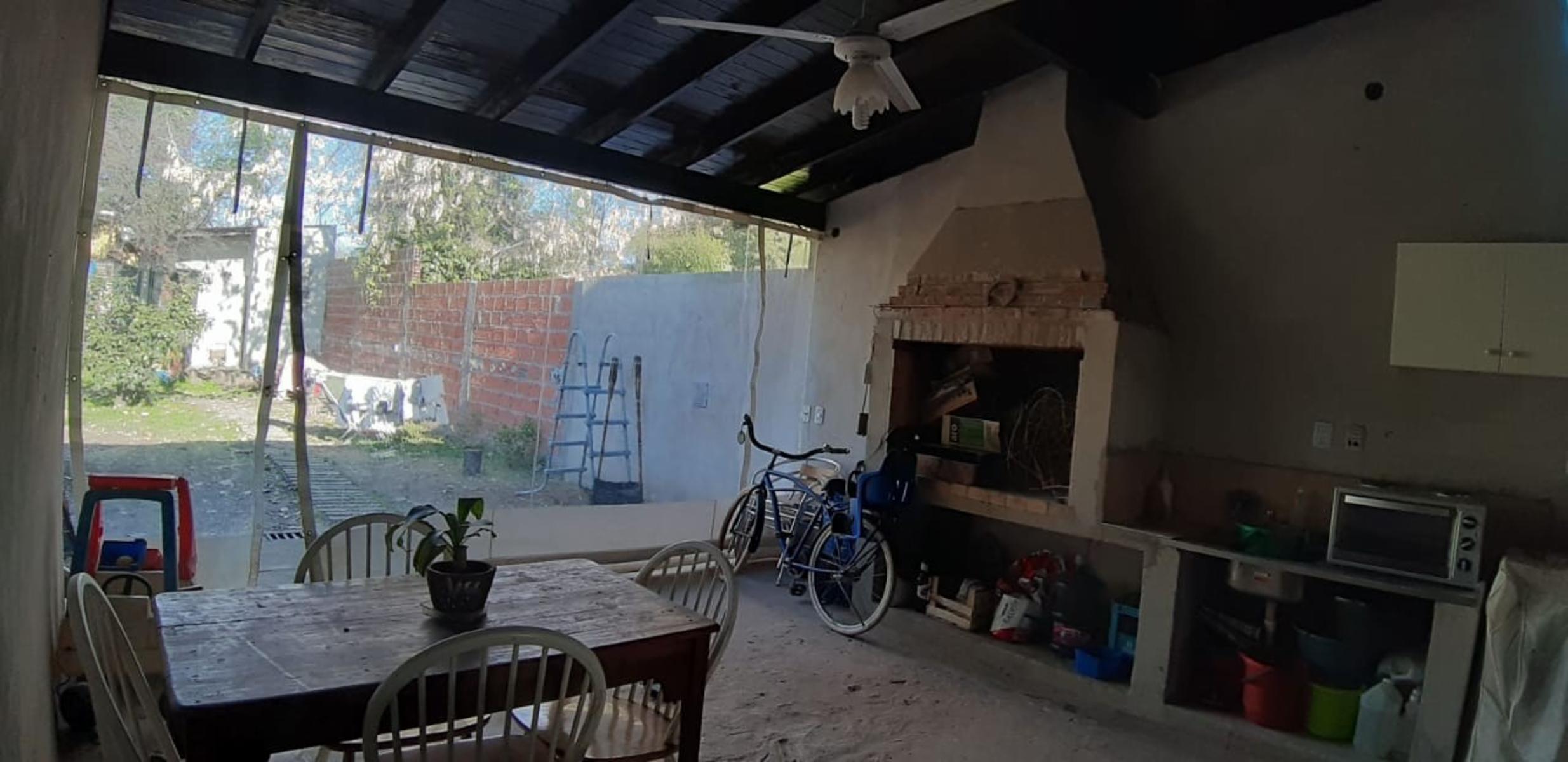 EXCELENTE PROPIEDAD CASA REMODELADA A NUEVA EN GARIN BUENA UBICACION — foto 4