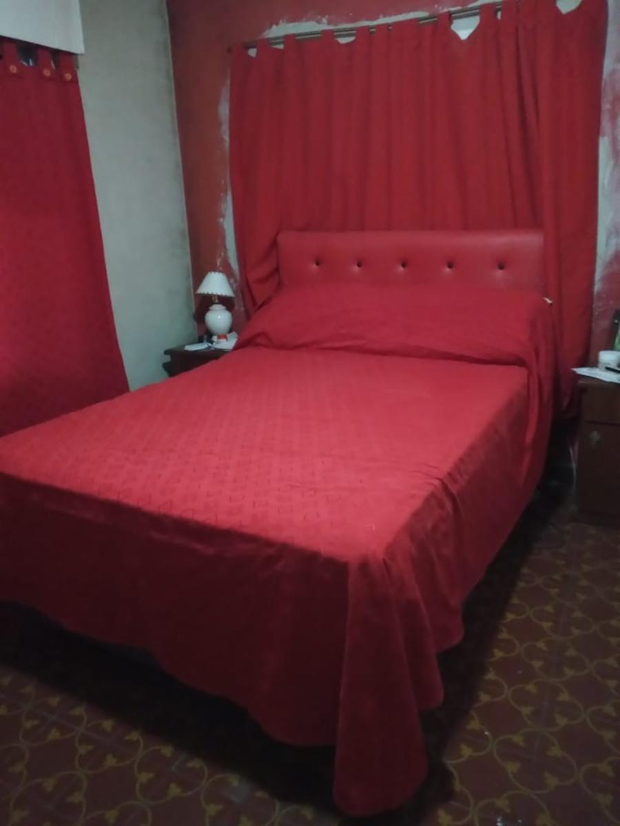 EXCELENTE PROPIEDAD CASA TRES AMBIENTES CON GARAGE JARDIN Y PATIO, DEPARTAMENTO 1 AMBIENTE CON BAÑO Y LOCAL COMERCIAL FUNCIONANDO — foto 4