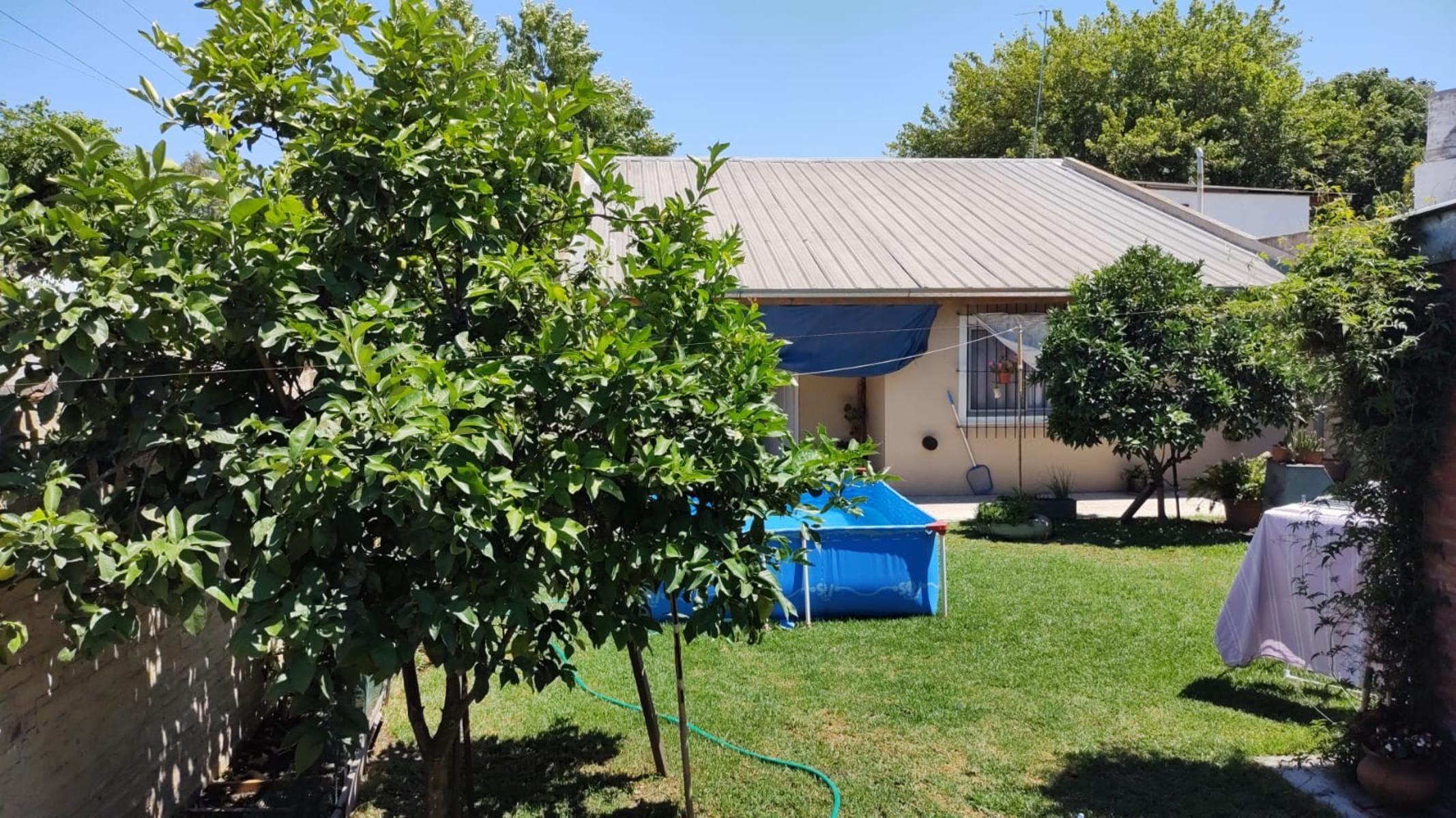 EXCELENTE PROPIEDAD CENTRICA VIVIENDA DE CUATRO AMBIENTES CON ENTRADA DE AUTO PARQUE QUINCHO PARRILA Y DOS ENTRADA DE PEATON — foto 10
