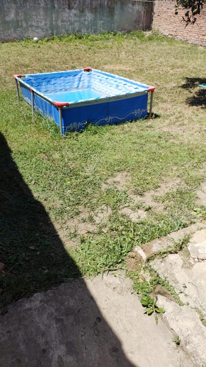 EXCELENTE PROPIEDAD MULTIFAMILIAR CON DOS VIVIENTDAS DE TRES AMBIENTES CON PATIO Y ENTRADA DE AUTOS Y TODOS LOS SERVICIOS — foto 8