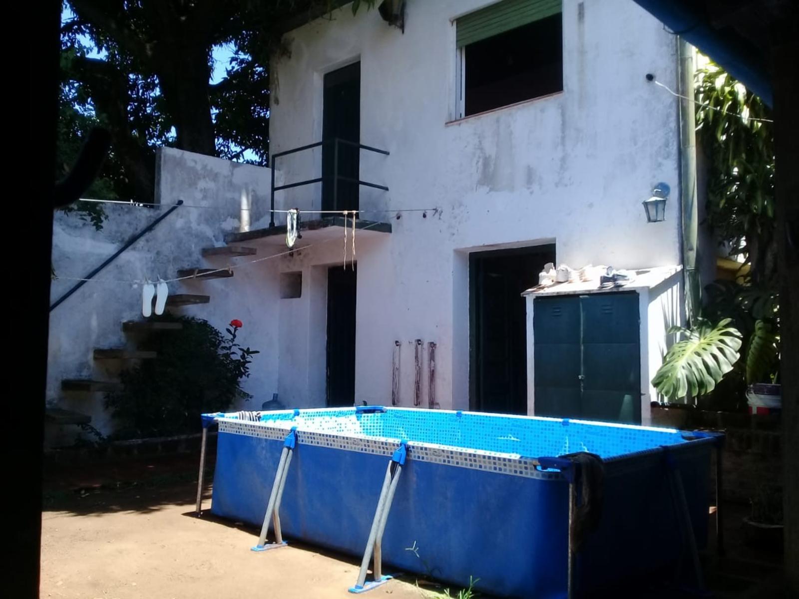 EXCELENTE PROPIEDAD CENTRICA DE CUATRO AMBIENTES MAS CUARTO DE HUESPDES GARAGE ENTRADA PRINCIPAL Y LATERAL — foto 10