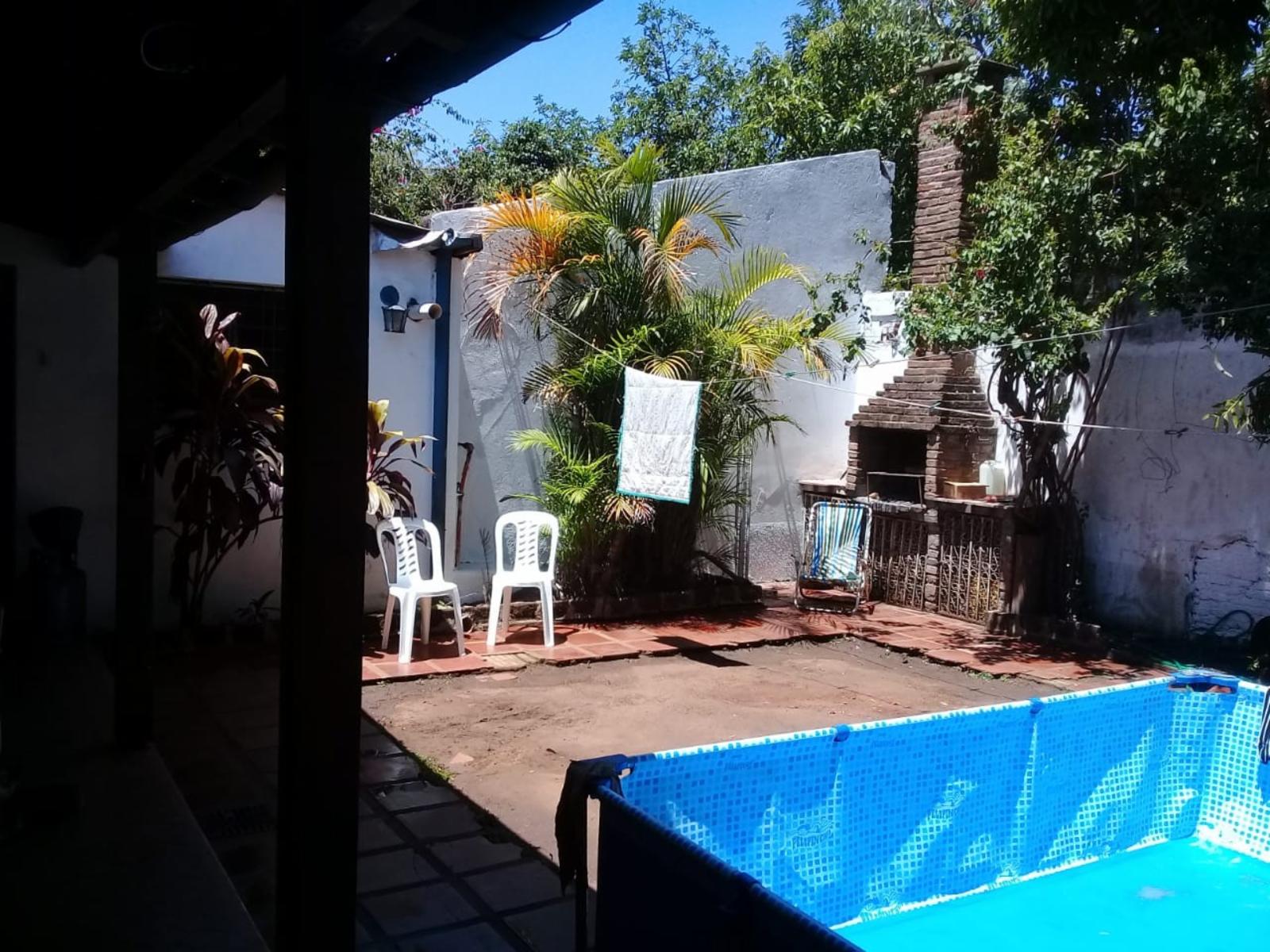 EXCELENTE PROPIEDAD CENTRICA DE CUATRO AMBIENTES MAS CUARTO DE HUESPDES GARAGE ENTRADA PRINCIPAL Y LATERAL — foto 11