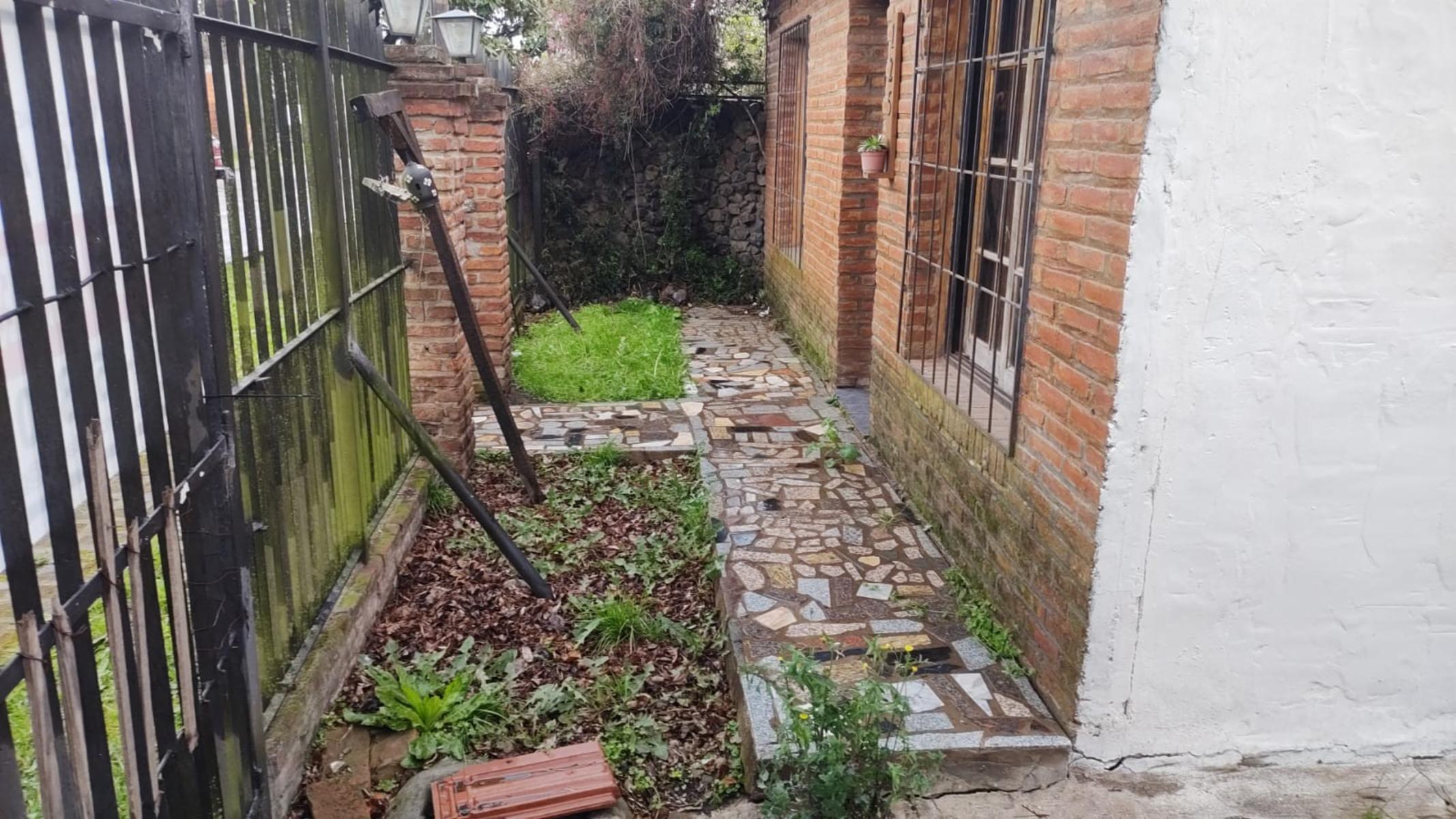 EXCELENTE PROPIEDAD DE TRES AMBIENTES CON JARDIN, PATIO ENTRADA DE AUTO Y FONDO LIBRE CON CALLE ASFALTADA, A TRES CUADRAS DEL CENTRO DE LA CIUDAD DE GARIN — foto 13