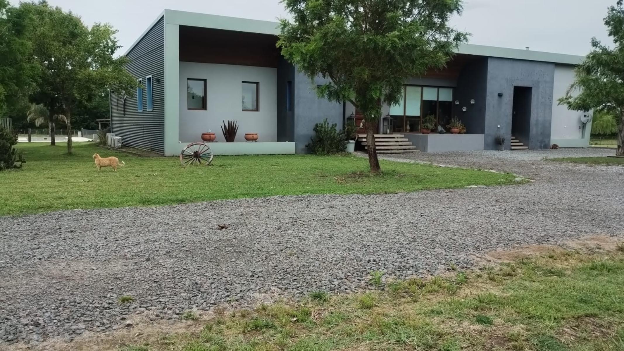 CASA EN CHACRA DE TRES HECTARIAS, VISTA PANORAMICA AL PARQUE GALERIA SEMICUBIERTA CON HORNO Y PARRILLA BODEGA EN SUBSUELO CANCHA DE PADLE VIDRIADA PISCINA Y POTRERO CON LAGO - 3