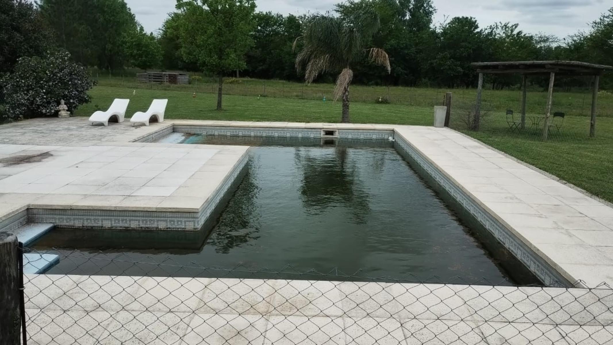 CASA EN CHACRA DE TRES HECTARIAS, VISTA PANORAMICA AL PARQUE GALERIA SEMICUBIERTA CON HORNO Y PARRILLA BODEGA EN SUBSUELO CANCHA DE PADLE VIDRIADA PISCINA Y POTRERO CON LAGO - 13