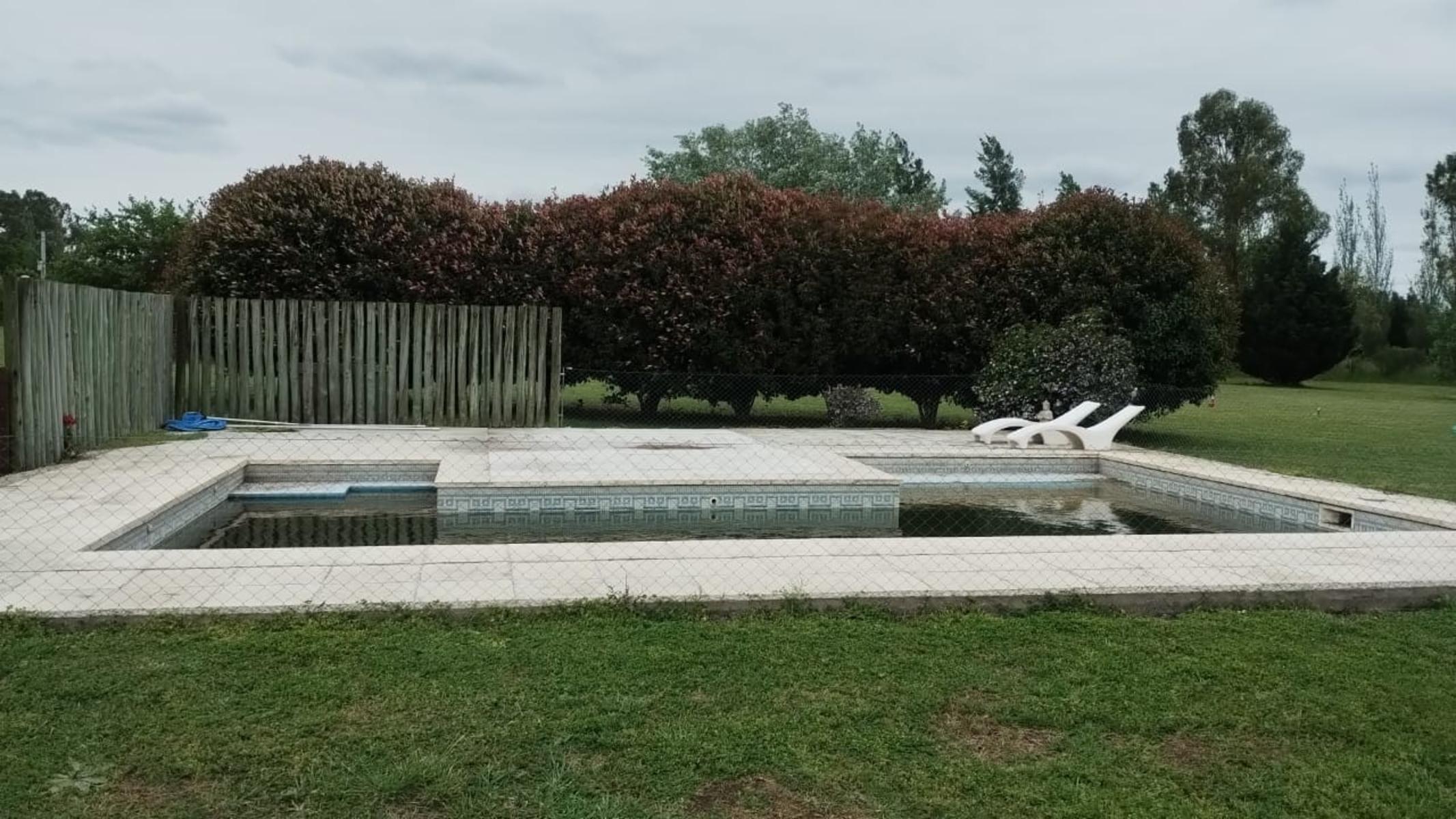 CASA EN CHACRA DE TRES HECTARIAS, VISTA PANORAMICA AL PARQUE GALERIA SEMICUBIERTA CON HORNO Y PARRILLA BODEGA EN SUBSUELO CANCHA DE PADLE VIDRIADA PISCINA Y POTRERO CON LAGO - 14
