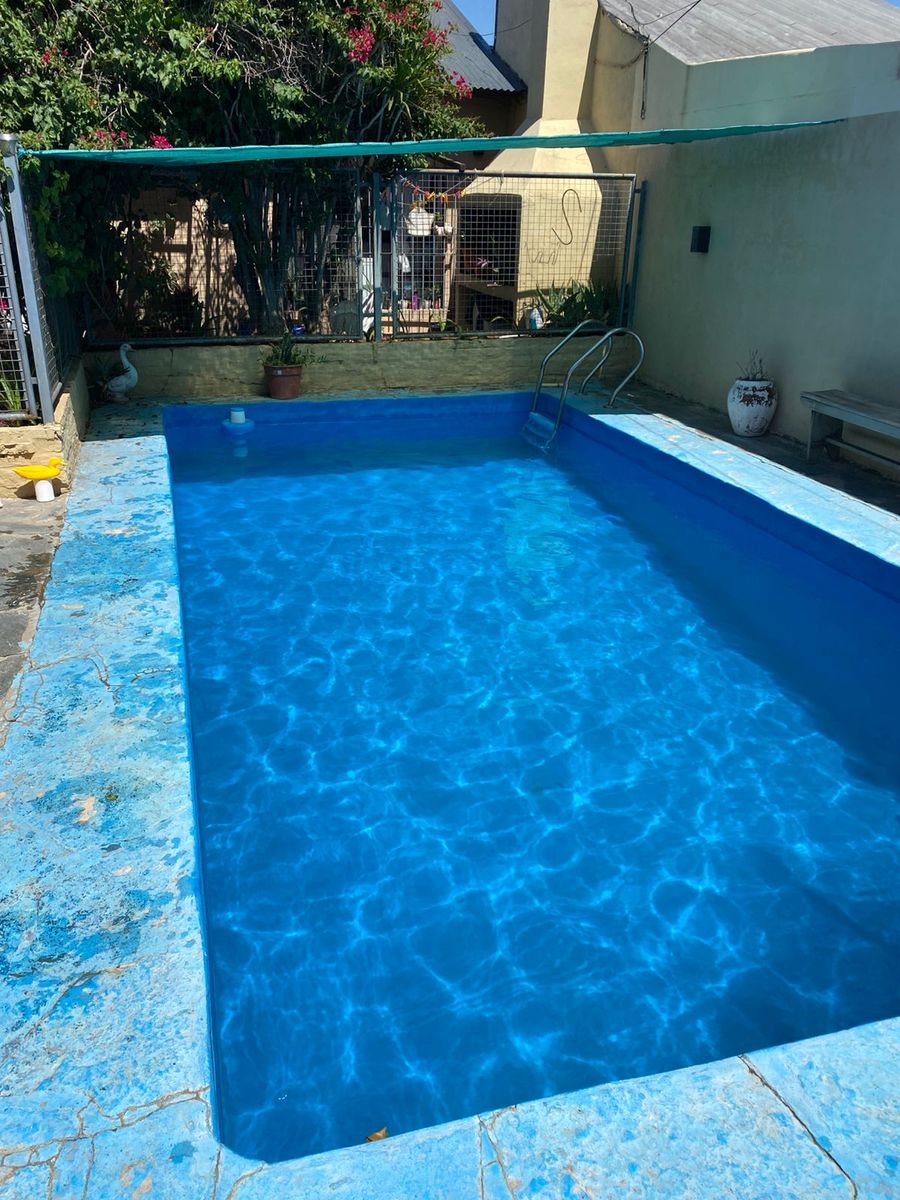 Excelente propiedad de cuatro ambientes con entrada de auto patio ypiscina — foto 10