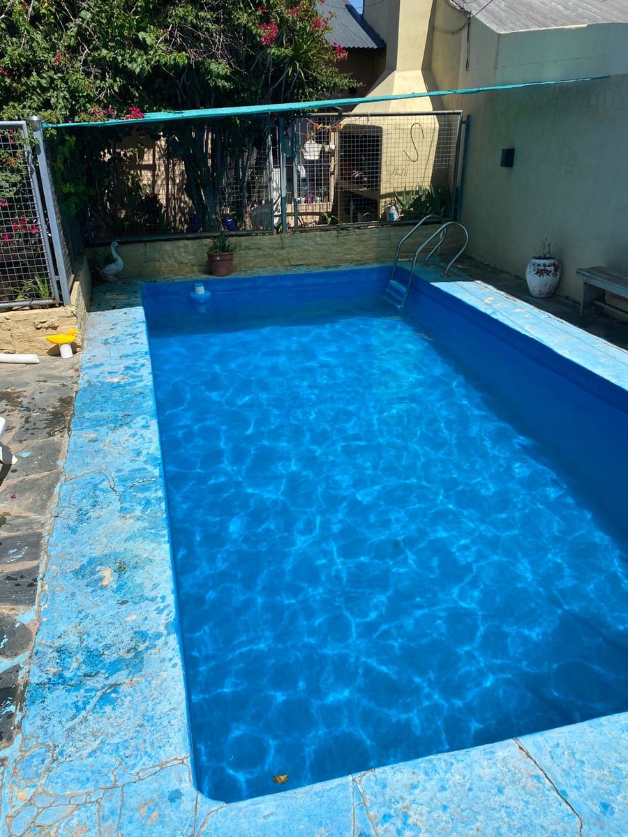Excelente propiedad de cuatro ambientes con entrada de auto patio ypiscina — foto 11