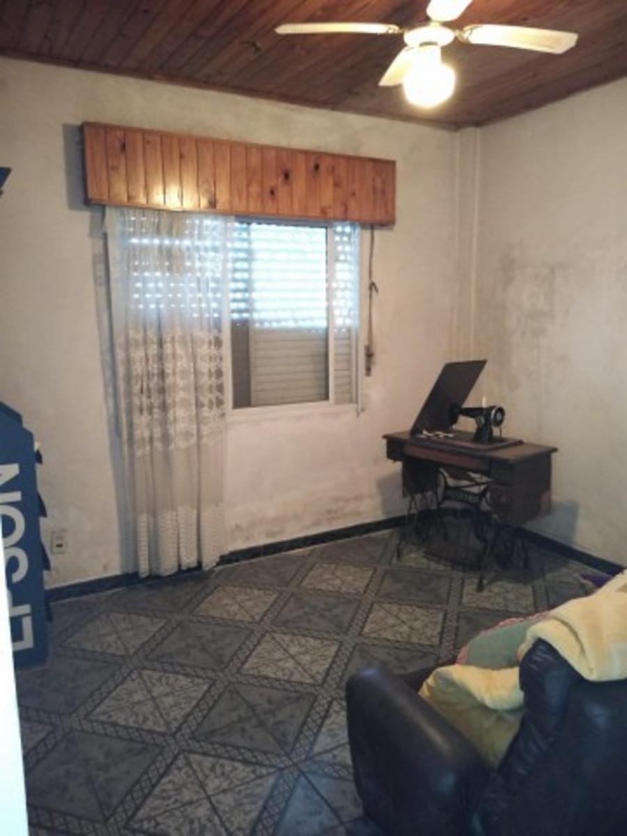 Retasado venta por viaje Casa con local barrio Monte Cudine — foto 4