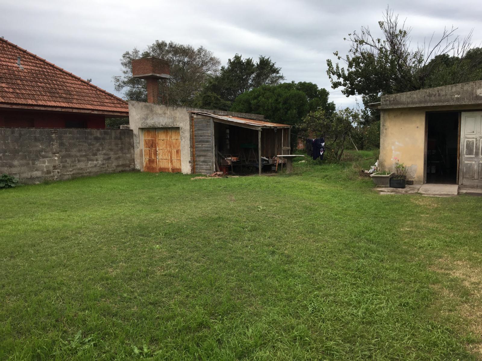 SE VENDE GRAN LOTE CON CASA Y LOCAL A LA CALLE ZONA QUEQUEN — foto 2