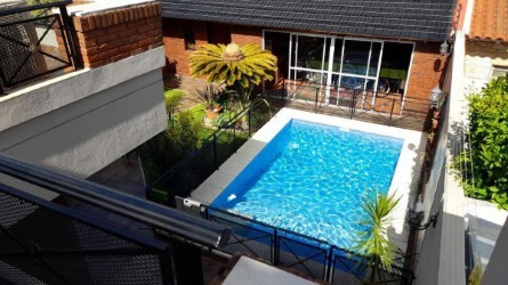 VENTA CASA 5 AMBIENTES CON PILETA PARQUE Y COCHERA — foto 4